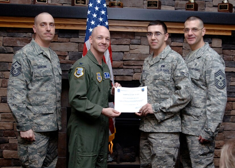 FAIRCHILD AIR FORCE BASE, Wash. – Master Sgt. Jeff Birkland, 92nd Maintenance Squadron first sergeant, nominates Senior Airman Christopher Krause, 92nd MXS fuel systems journeyman, for the Diamond Sharp Award Jan. 22.The award was presented by Col. Marshal Morrison, 92nd Operations Group commander, and Chief Master Sgt. David Nordel, 92nd Air Refueling Wing command chief, during the Diamond Sharp Breakfast at the Warrior Dining Facility. (U.S. Air Force photo / Airman 1st Class Melissa L. Barnett)