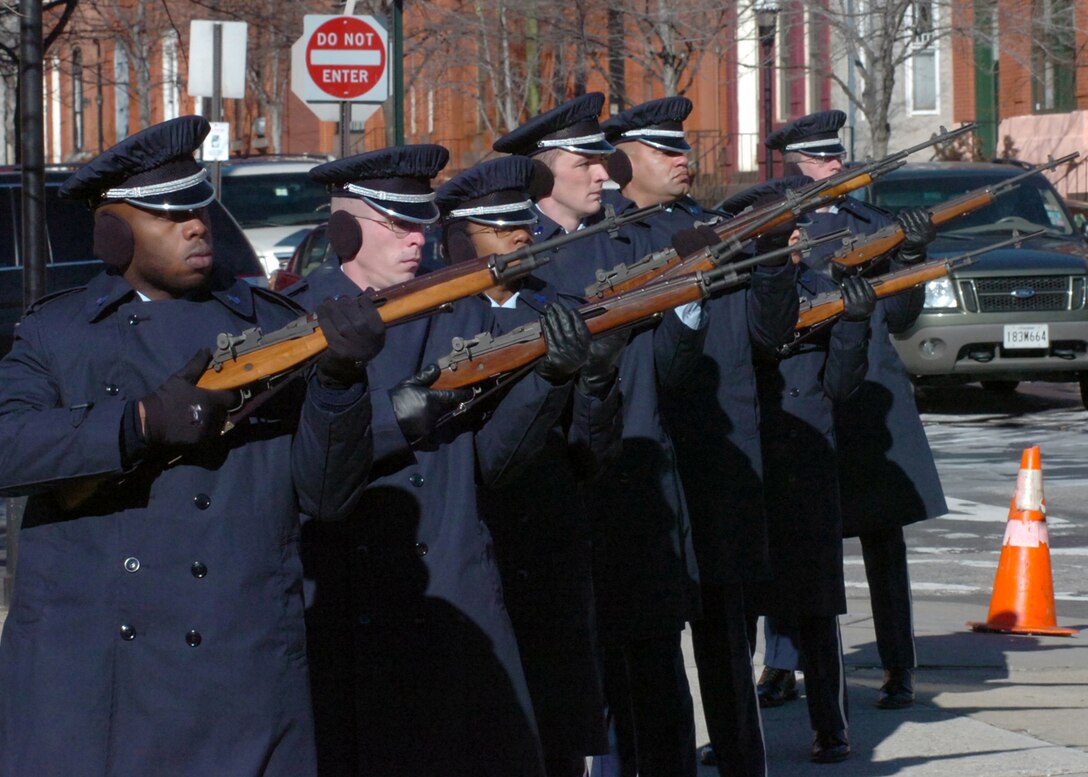 The honor guard firing party renders a three-volley-salute in honor of the deceased members military service. (Official U.S. Air Force photo by Bobby Jones)