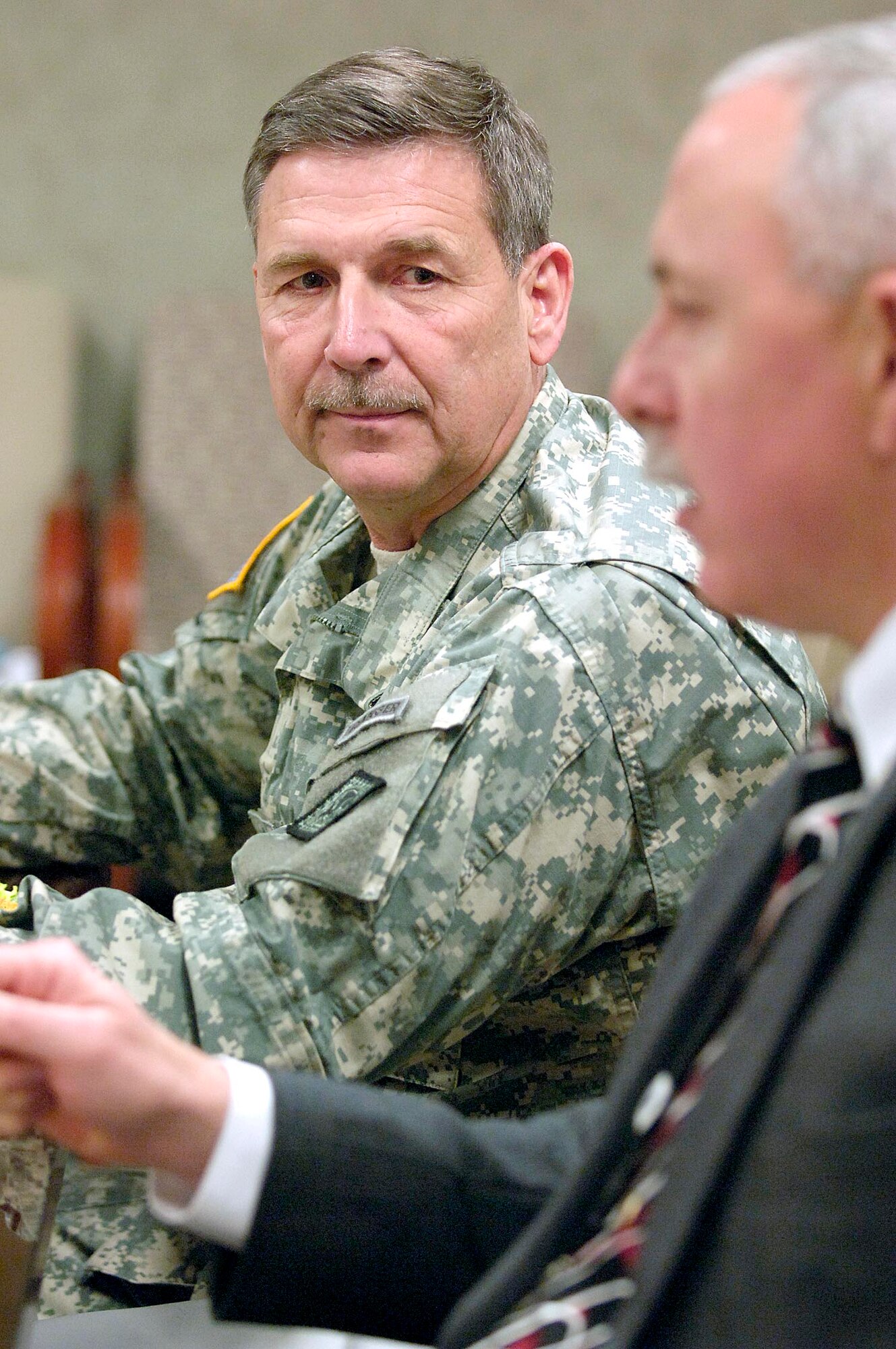 Maj. Gen. William D. Wofford, Arkansas National Guard Adjutant General, listens as Mr. John Over, Oklahoma City Air Logistics Center executive director, explains Tinker’s initial steps in growing the Voluntary Protection Program on base.  The general and several other high-ranking Guardsmen came to Tinker Jan. 16 to learn from VPP base representatives how to successfully start the safety program in their units. (Air Force photo/Margo Wright) 