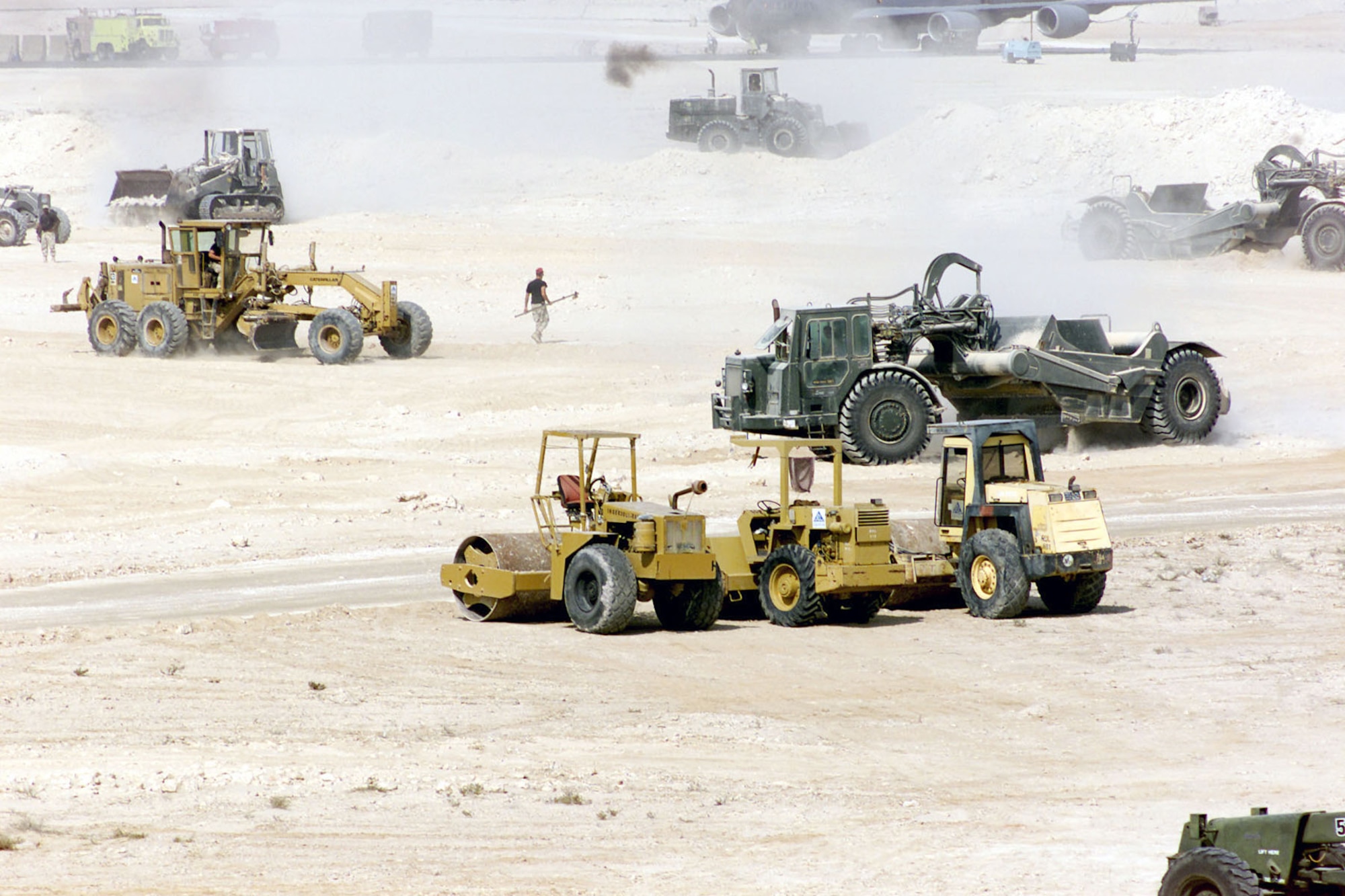 The 823rd RED HORSE Squadron (RHS) levels out an area and construct a new aircraft parking ramp support of Operation Enduring Freedom. (U.S. Air Force photo)