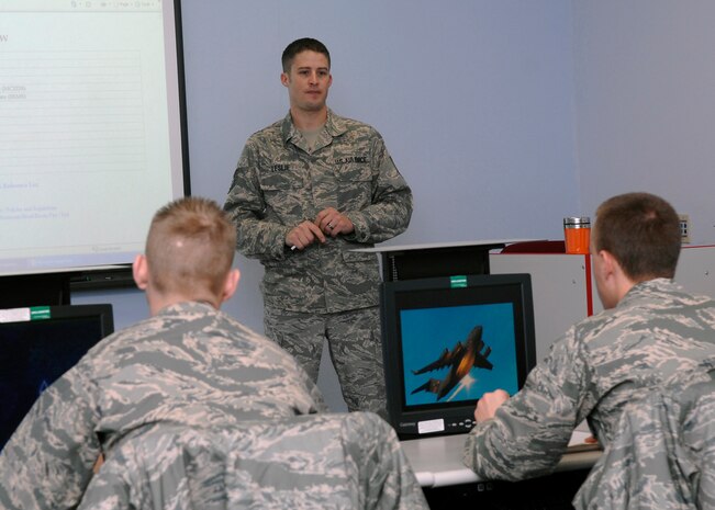 Tech. Sgt. Cameron Leslie teaches flight control fundamentals to Airmen on Charleston AFB Jan. 20. For fiscal year 2008, five instructors from the training detachment taught a total of 5,678 hours, graduating 52 new C-17 crew chiefs. Sergeant Leslie is an instructor with the 373rd Training Squadron Detachment 5. (U.S. Air Force photo/Senior Airman Katie Gieratz)