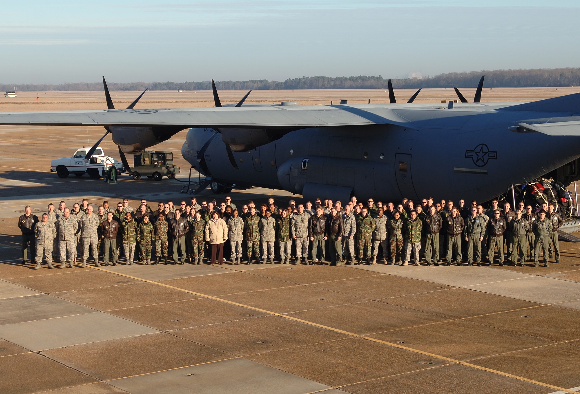 105 BLAZE team members pause before boarding a Team Little Rock C-130J prior to their departure for the Air Education and Training Command Symposium Jan. 14. The AETC Symposium was a two-day conference in San Antonio hosted by AETC and the Air University. (U.S. Air Force photo by Elizabeth Owens)