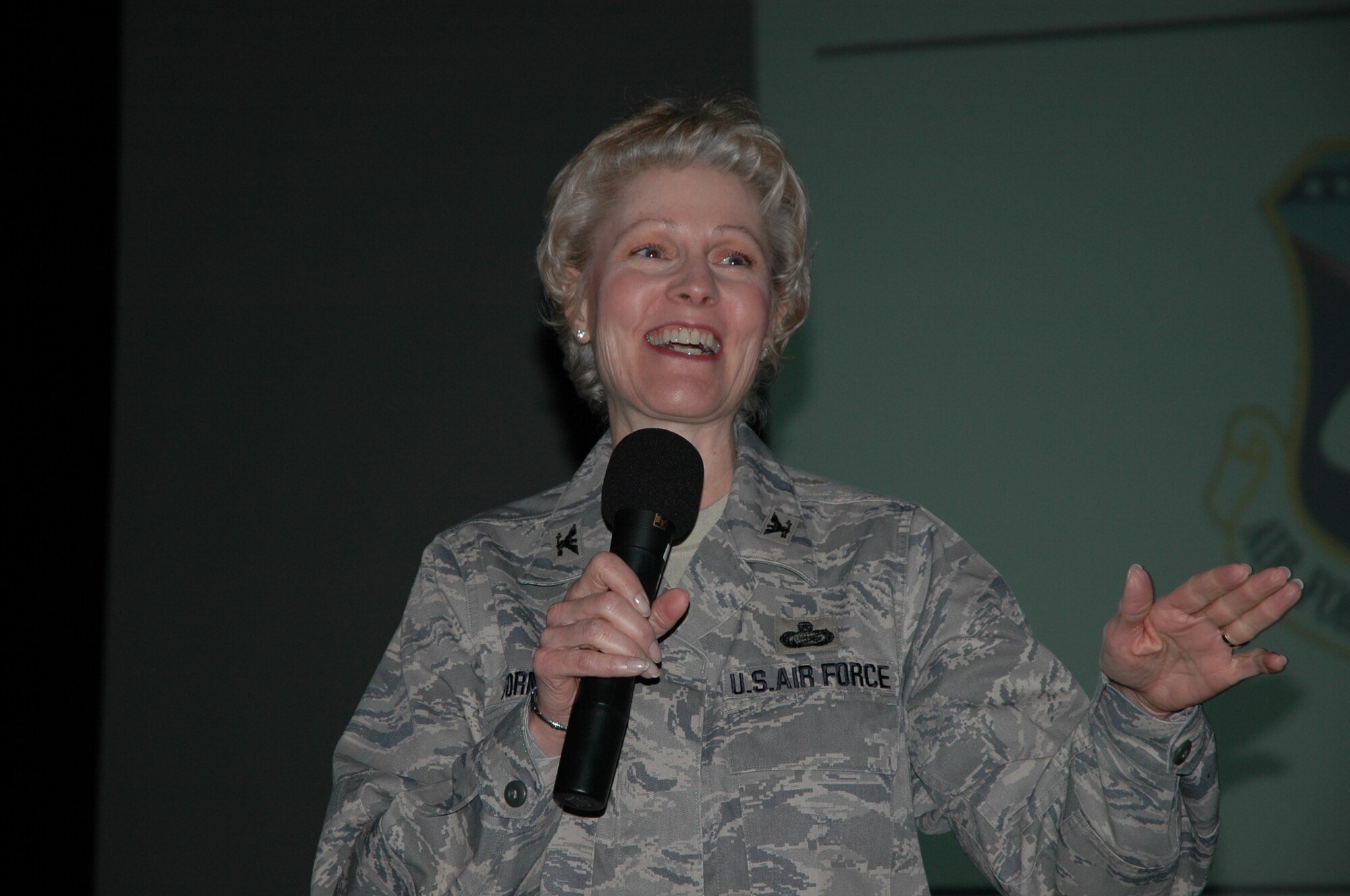 Col. Leslie Formolo, chief of Airmen Assignment at the Air Force Personnel Center, shares a smile during a Q & A session after the AFPC "Spread the Word" briefing Jan. 21 in the Patrick Base Theater. (U.S. Air Force photo by Chris Calkins)