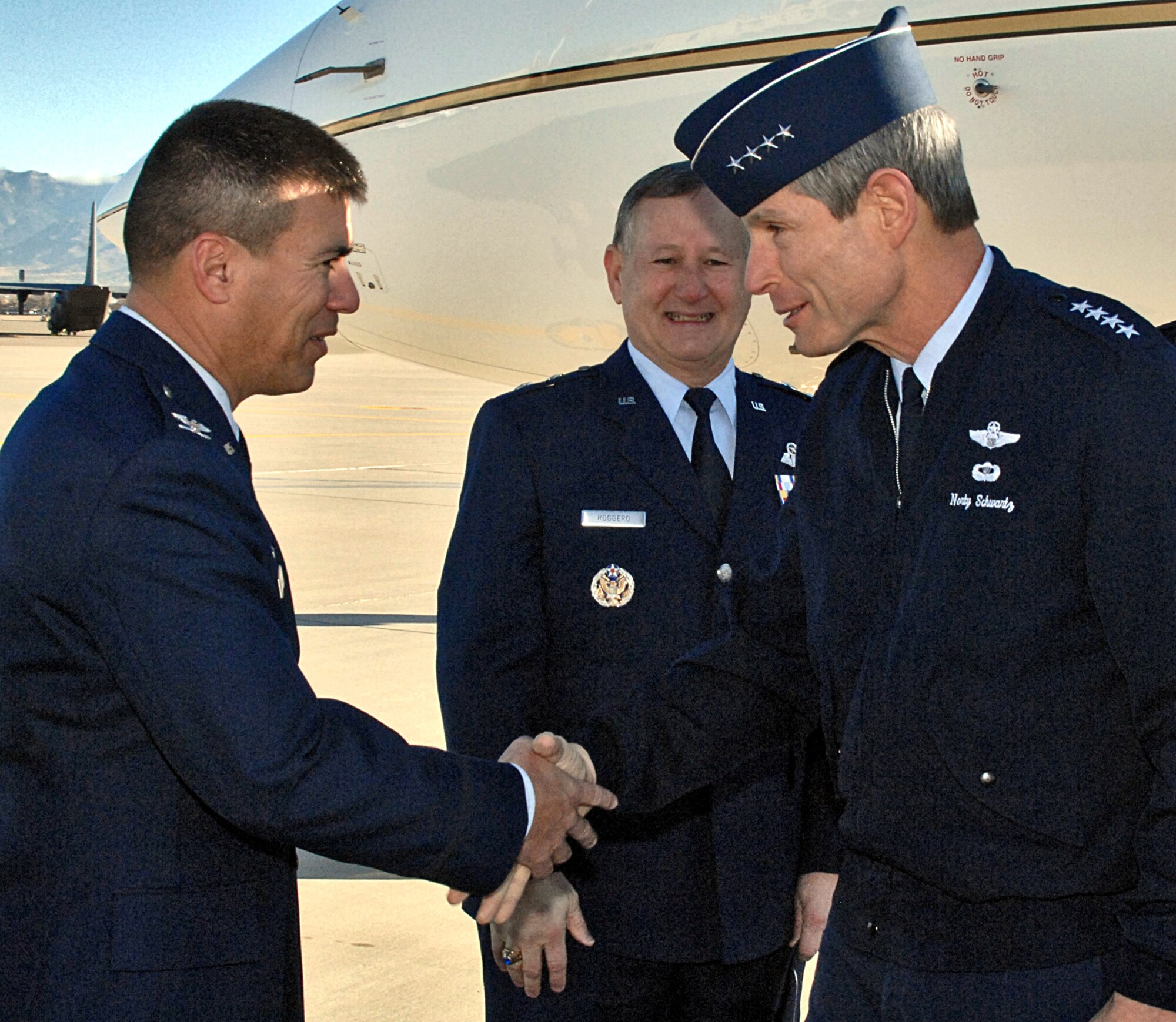 Col. Michael S. Duvall, 377th Air Base Wing commander, welcomes Air Force Chief of Staff Gen. Norton Schwartz to Kirtland AFB, Jan. 13. General Schwartz visited the base to preside over the assumption of command ceremony for the Air Force Safety Center to Maj. Gen. Frederick F. Roggero, center. U.S. Air Force Photo by Damian Bohannon