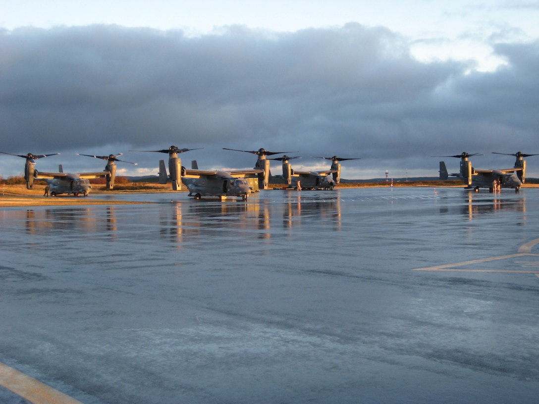 Four CV-22 Ospreys sit on the flightline at St. Johns, Nova Scotia, Oct. 19, 2008. The CV-22s, from the 8th Special Operations Squadron at Hurlburt Field, Fla., flew through St. Johns as part of a 5,300 nautical mile trip to Mali, Africa in support of Exercise Flintlock. (U.S. Air Force photo/Capt. Christian Helms)
