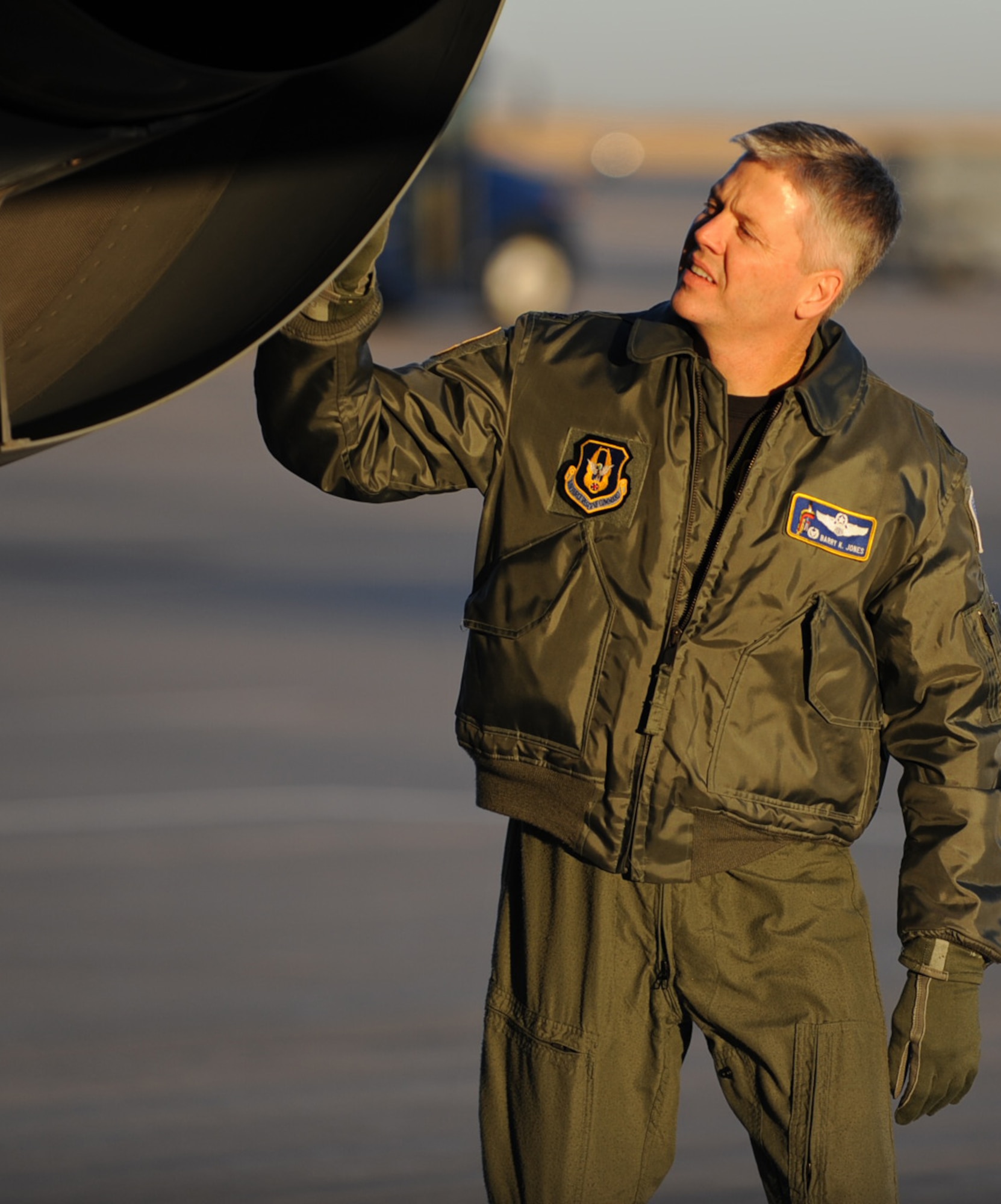 Lt. Col. Barry Jones inspects the engine of a KC-135 Stratotanker at McConnell Air Force Base, Kan., prior to piloting the tanker during an aerial refueling mission. Colonel Jones is the new commander of the 931st Operations Support Flight. (U.S. Air Force photo/Tech. Sgt. Jason Schaap)