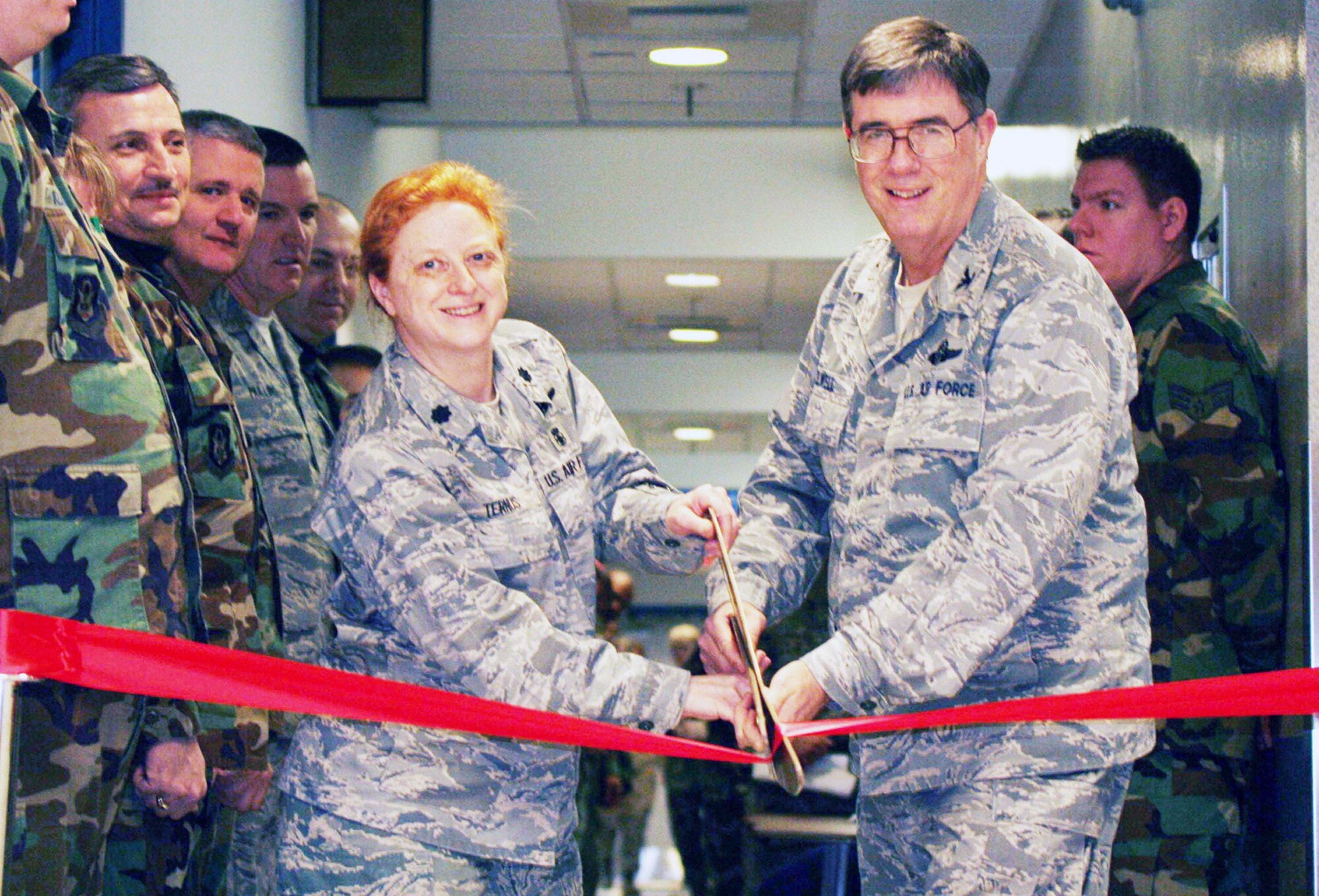 Col. Gordon Elwell, 911th Airlift Wing Commander and Lt. Col. Mona Ternus, 911th Aeromedical Staging Squadron Commander, 911th AW cut a ribbon to commemorate the opening of the Medical Treatment Facility Annex. Groundbreaking for the annex started in May 2007 and the first occupants setup shop in October 2008.
