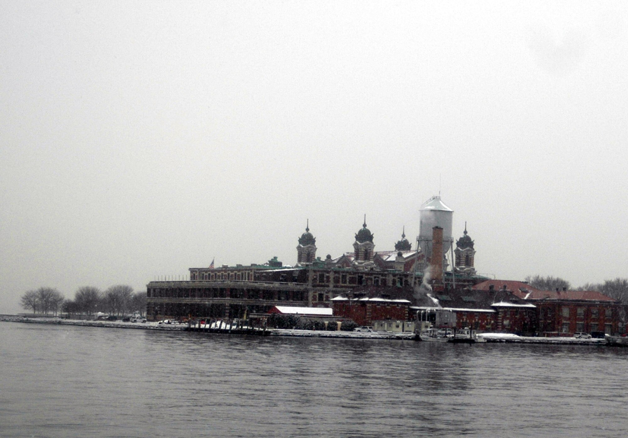 The immigrant inprocessing building on Ellis Island, N.Y., is seen in this photo Jan. 19, 2009.  Ellis Island was one of America's entry ways for immigrants in the 19th and 20th centuries.  Many millions of immigrants processed through the station after first arriving to America by ship from foreign countries.  This view was taken from Liberty State Park in Jersey City, N.J.  (U.S. Air Force Photo/Tech. Sgt. Scott T. Sturkol)