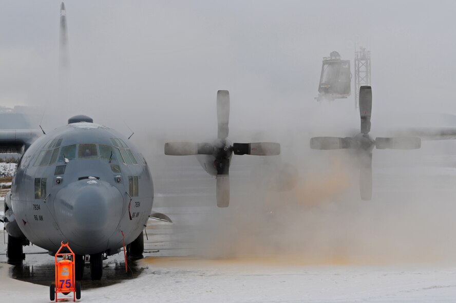 A C-130 Hercules starts the day off by getting de-iced on the Ramstein Air Base flightline Jan. 9, 2009. (U.S. Air Force photo by Airman 1st Class Grovert Fuentes-Contreras)