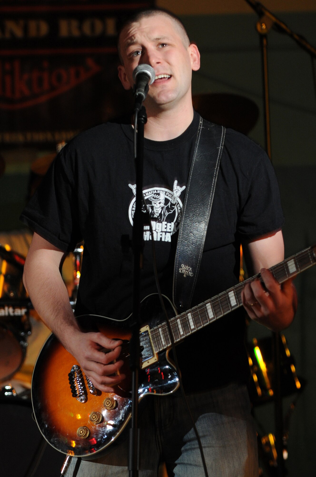 Senior Airman Doug Overturf, guitarist of the band Friction Addiction, performs at the Battle of the Bands event Jan. 16, 2009, on Ramstein Air Base. The event was sponsored by Armed Forces Against Drunk Driving. (U.S. Air Force photo by Senior Airman Nathan Lipscomb) 
