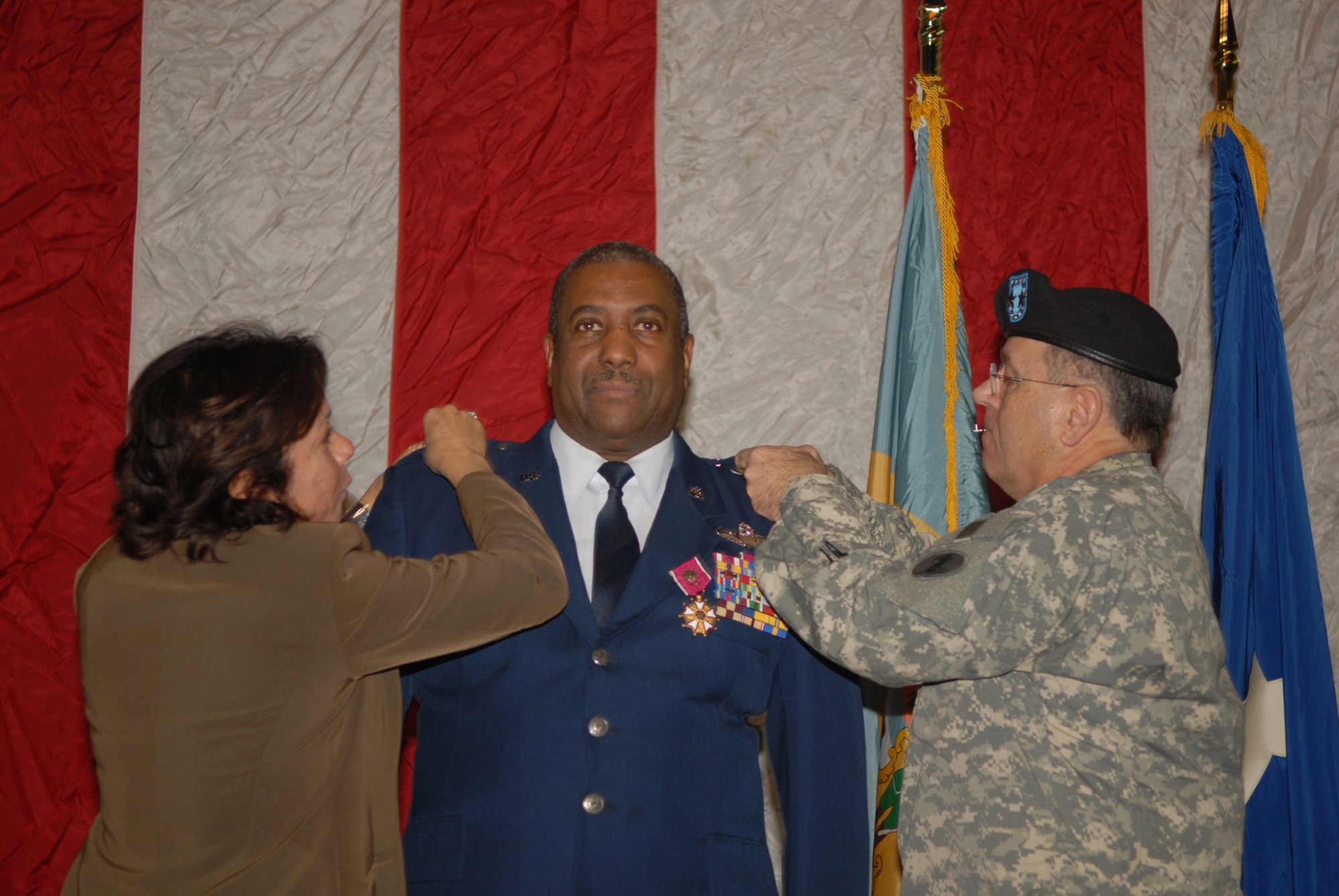 Brig. Gen. Ernest Talbert, vice commander, Delaware Air National Guard, is pinned with a second star signifying the honorary rank of major general in the Delaware National Guard upon his retirement from the Delaware ANG in New Castle, Del. on Jan. 11, 2009. Gen. Talbert's wife Richelle and Delaware National Guard Adjutant General Maj. Gen. Francis Vavala perform the pinning on ceremony. Gen. Talbert, a rated command pilot with more than 6,500 flight hours, flew C-130 aircraft missions in Operation Desert Storm and was the 166th Airlift Wing commander in Operation Iraqi Freedom. During his 36-year career he became the first African-American colonel in the Delaware ANG, and the first and only African-American general in the over 350-year history of the Delaware National Guard. (U.S. Air Force photo/Staff Sgt. Melissa Chatham)