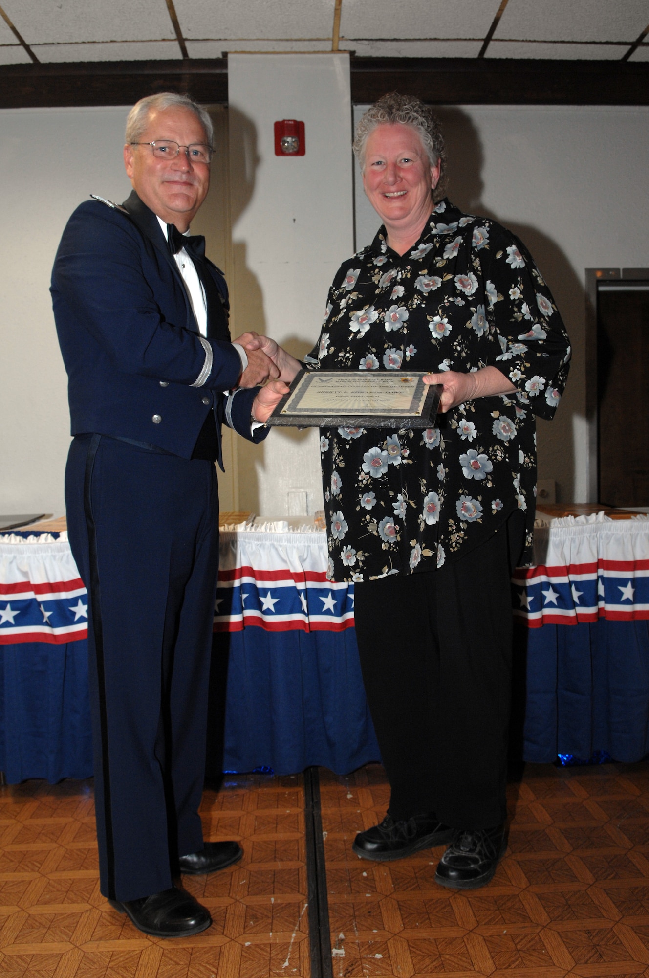 Sheryl L. Edwards of 336 ARS receives her award for Civilian of Quarter, 1st QTR in the GS-07 thru GS-11 category from Brig. Gen. James L. Melin, commander, 452 AMW, on Jan. 10, 2009. (U.S. Air Force photo by Tech. Sgt. Elizabeth Concepcion)