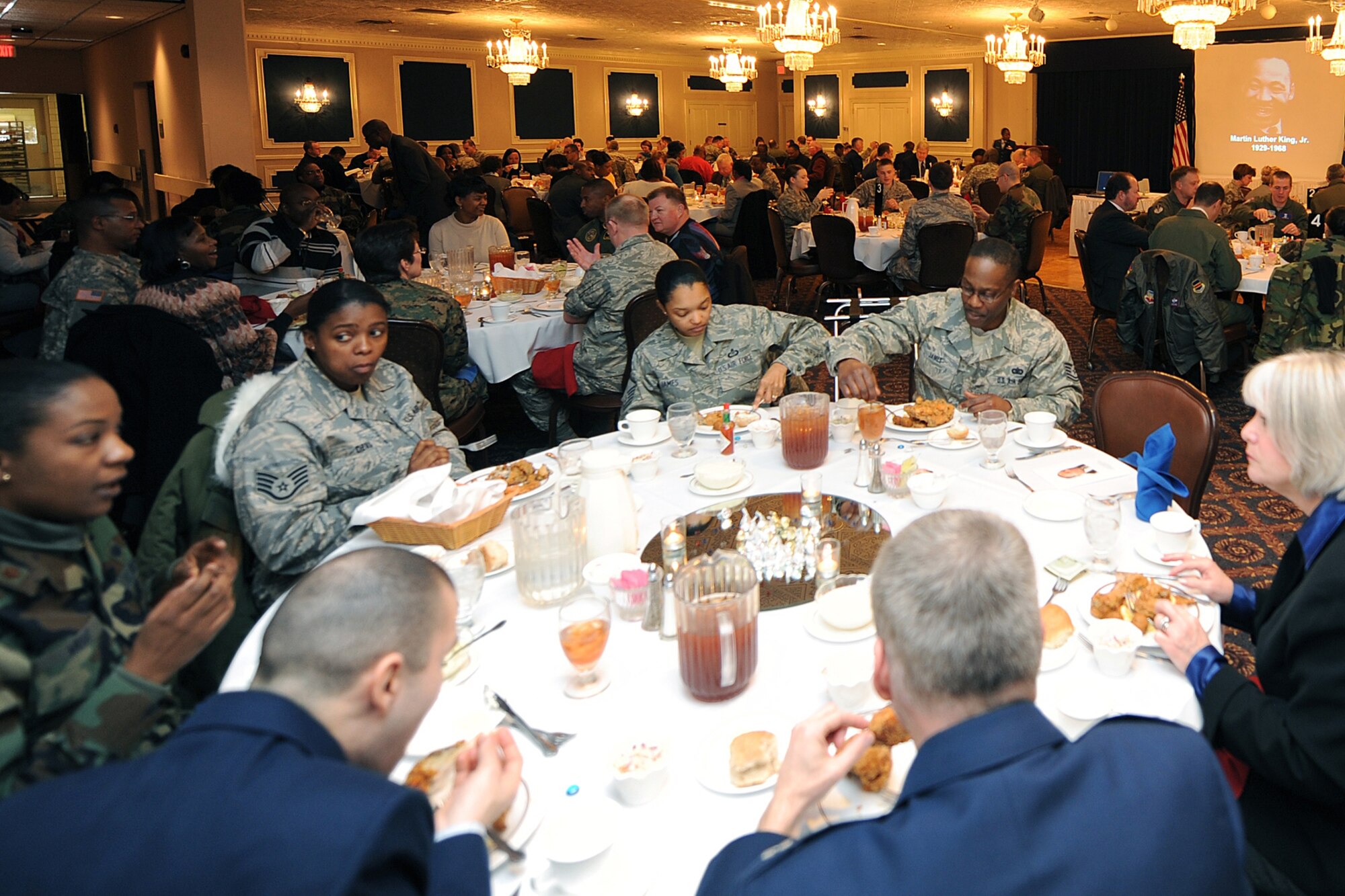 OFFUTT AIR FORCE BASE, Neb. -- Patrons were treated to a soul-food menu as they watched a slide show dedication to Martin Luther King, Jr., compiled by Chaplain (Capt.) Scott Nupson at the Patriot Club Jan. 16, as part of this year's Martin Luther King Jr. Commemorative Luncheon. Brig. Gen. (Ret) Toreaser A. Steele was the guest speaker and gave an insperational speech in honor of the late Martin Luther King, Jr. 