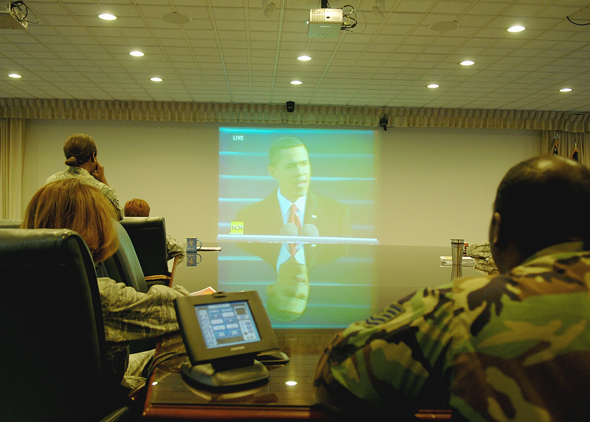 Members of the 49th Fighter Wing watch as President Barack Obama gives the inaugural address after becoming the 44th President of the United States, Jan. 20, at Holloman Air Force Base, N.M. (U.S. Air Force photo/ Senior Airman Anthony Nelson Jr)