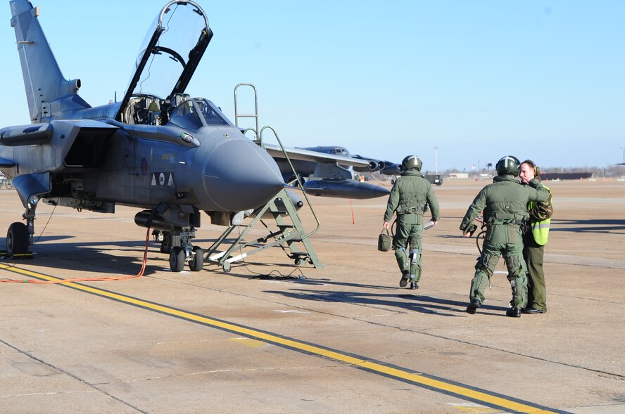 Members of the Royal Air Force prepare to fly a training mission as part of Green Flag East Jan. 15. The members are visiting from RAF Lossiemouth, Scotland, and are here for two weeks to fly close air support training missions between Barksdal eand For Polk, La. (Senior Airman Joanna M. Kresge/U.S. Air Force)