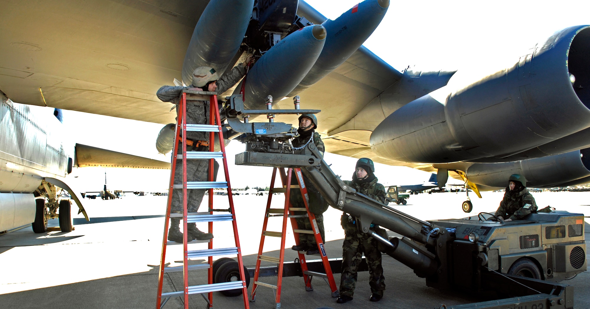 The 2d Aircraft Maintenance Squadron weapons load team is participating in the convential operational readiness exercise on Barksdale Air Force Base, La., Jan. 14. Two teams loeaded up to 39 internal and external weaponsin approximately two and a half hours. (Senior Airman Alexandra M. Sandoval/U.S. Air Force)