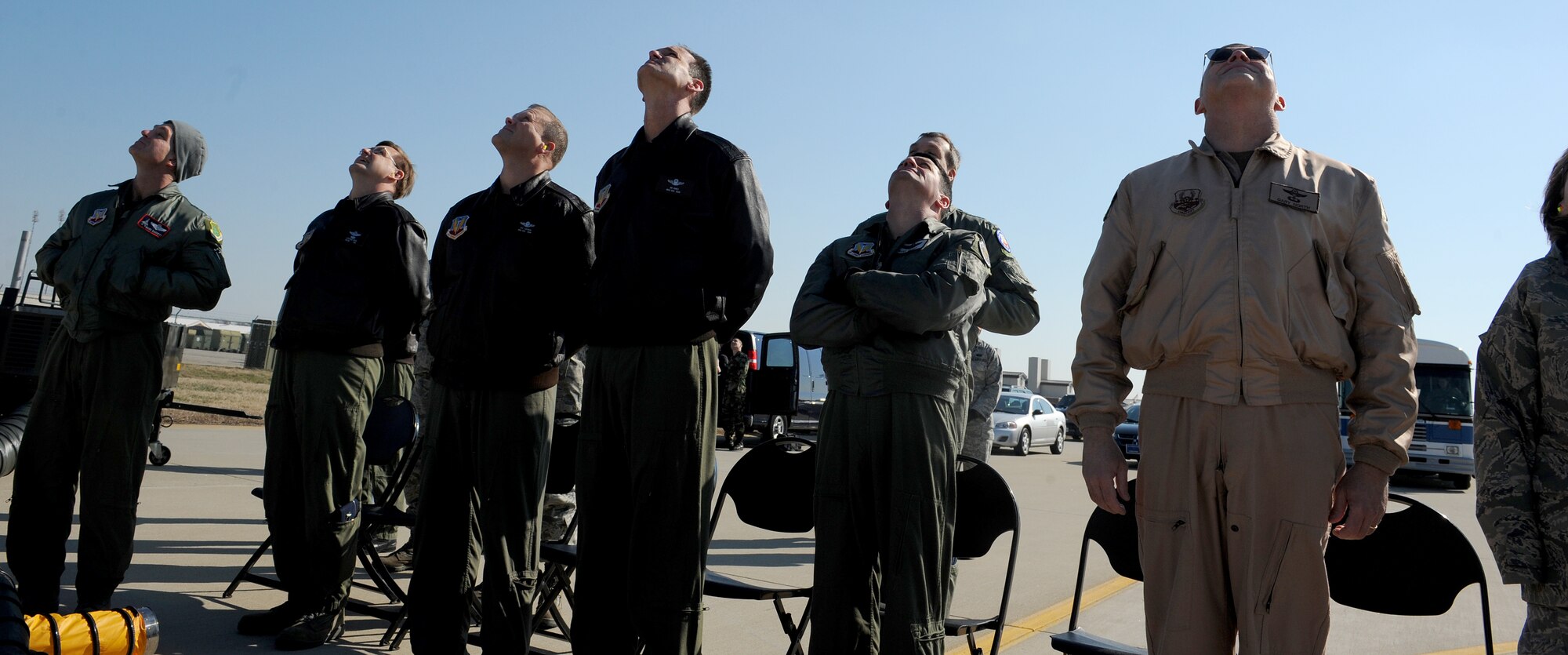 LANGLEY AIR FORCE BASE, Va. – Brig. Gen. Mark Barrett, 1st Fighter Wing commander, and Lt. Gen. Gary North, 9th Air Force commander, join others in watching the F-22 Raptor demonstration here Jan. 21. The certification demonstration for Gen. John D.W. Corley, commander of Air Combat Command, is scheduled for Feb. 4. (U.S. Air Force photo/Airman Rebecca Montez)