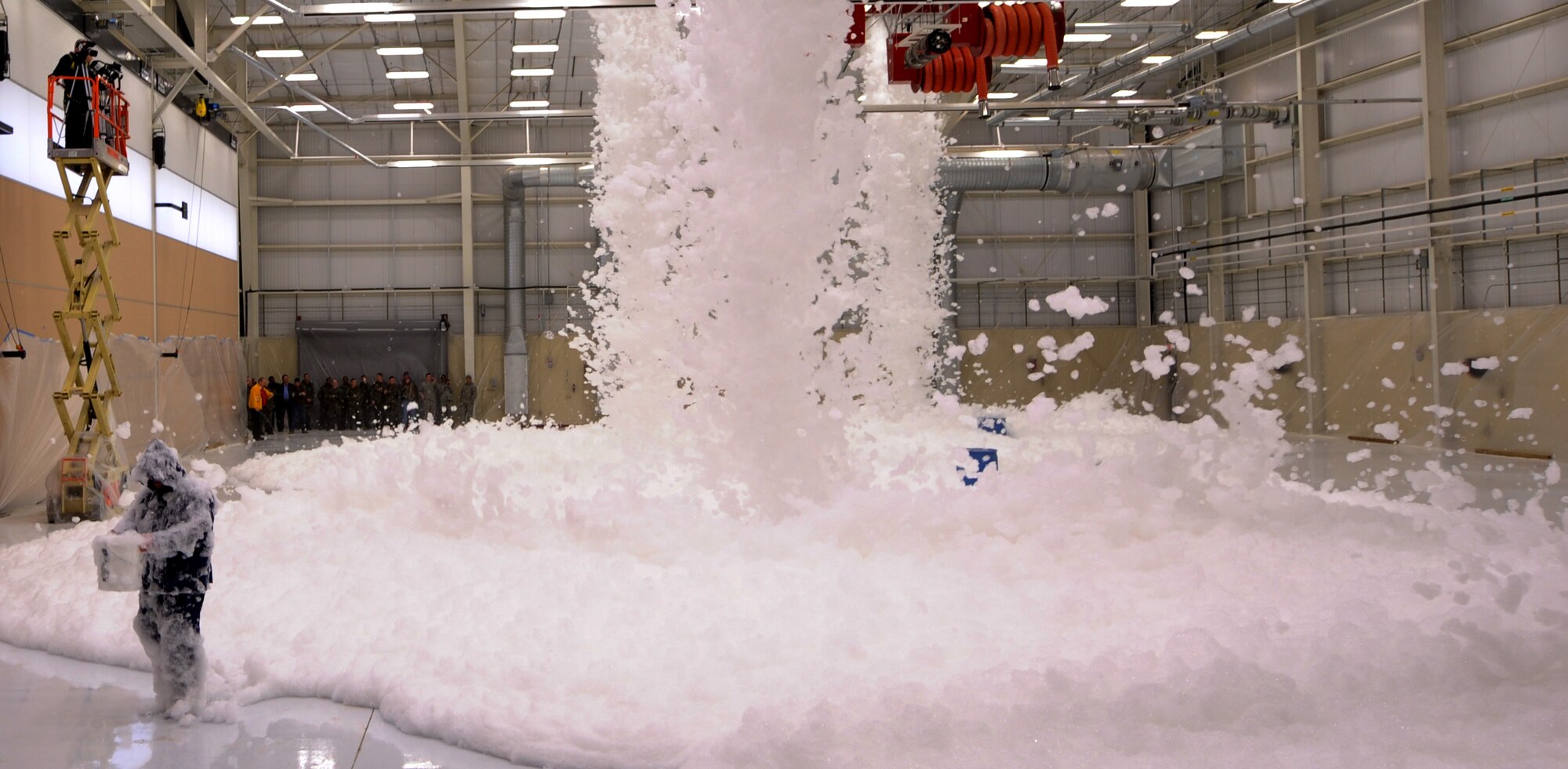 MOODY AIR FORCE BASE, Ga. -- A fire protection specialist takes a sample of the high expansion foam for testing here Jan. 21. The foam is tested by a refractometer to ensure correct portions of detergent and water are included in the mixture. (U.S. Air Force photo by Senior Airman Gina Chiaverotti)