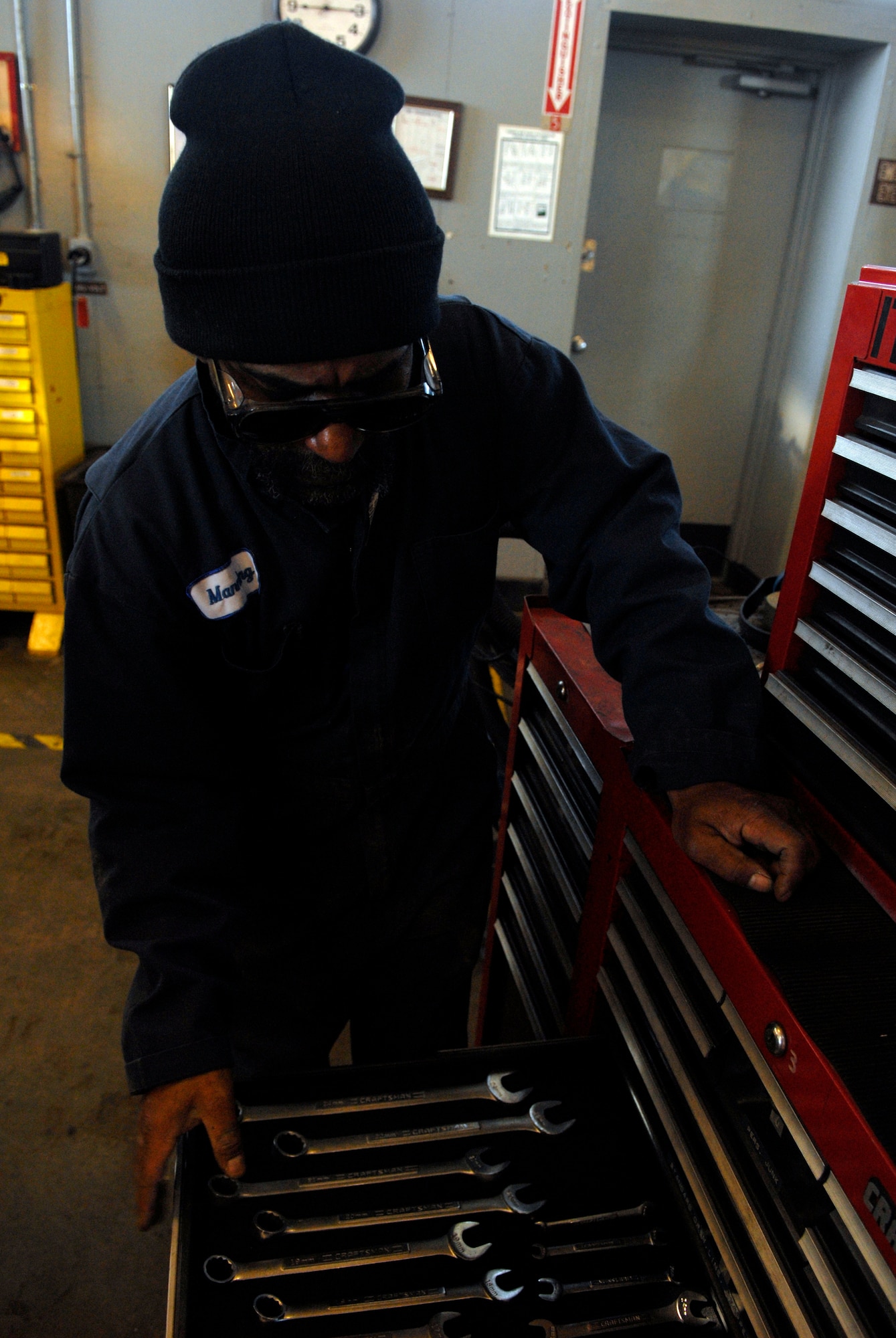 VANDENBERG AIR FORCE BASE, Calif. --  Bob Manning, a vehicle mechanic with the 30th Logistics Readiness Squadron, looks through his tool box while performing routine maintenance on a vehicle Jan. 13. (U.S. Air Force photo/Senior Airman Christian Thomas)