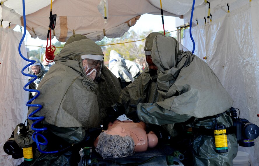 MOODY AIR FORCE BASE, Ga. – Personnel assigned to the 23rd Medical Group here use a decontamination station to treat a simulated patient during an All-Hazards Response Training exercise Jan. 22. (U.S. Air Force photo by Senior Airman Gina Chiaverotti)