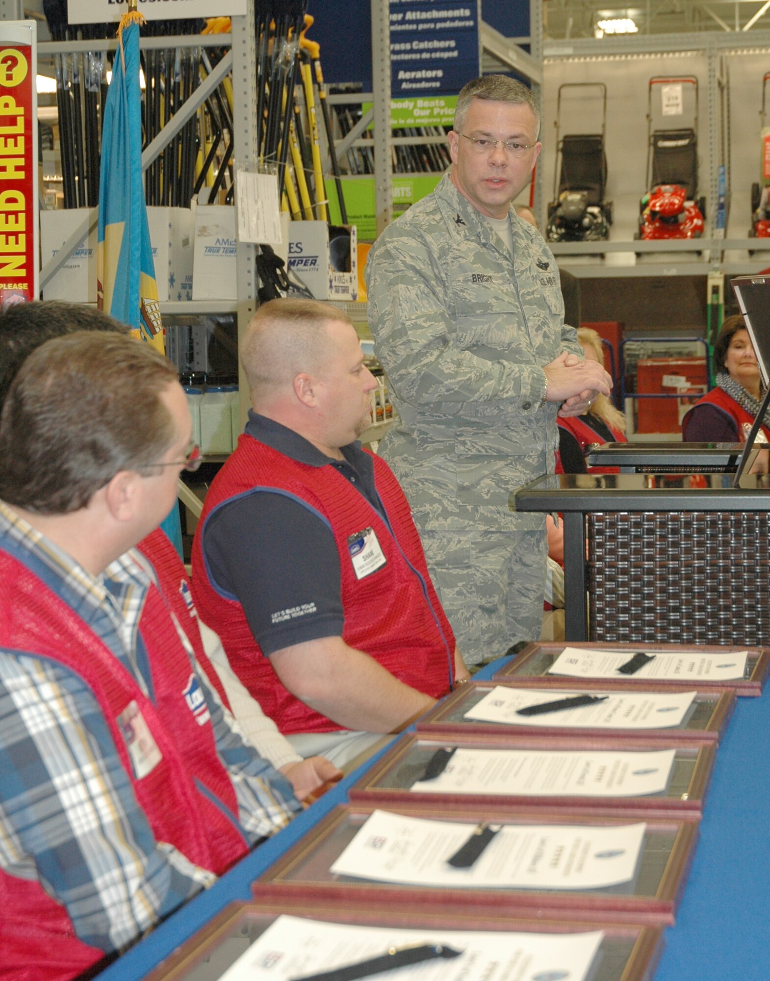 DOVER AIR FORCE BASE, Del. -- Col. Randal L. Bright, commander of the Air Force Reserve's 512th Airlift Wing, spoke to members of Lowe's human resources department in Middletown, Del., Jan. 22. During the Employer Support of the Guard and Reserve event, the Lowe's employees signed a pledge to support their fellow employees who are members of the Guard and Reserve. ESGR is a Department of Defense organization that promotes cooperation and understanding between Reserve component members and their civilian employers and assists in the resolution of conflicts arising from an employee's military commitment. ( U.S. Air Force photo/Senior Airman Andria J. Allmond)