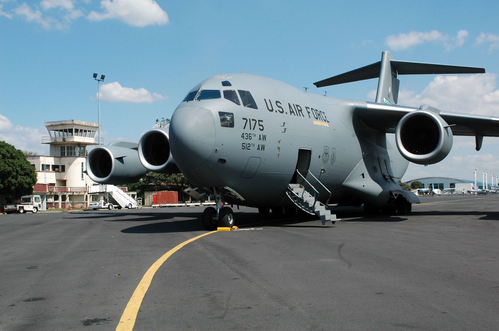DOVER AIR FORCE BASE, Del. -- A Dover C-17 Globemaster sits on the Managua International Airport, Nicarauga, Jan. 18. The Air Force Reserve's 326th Airlift Squadron delivered approximately 18,000 pounds of humanitarian cargo consisting of desks, chairs, file cabinets and books for use at a Nicaraugan university library. (U.S. Air Force photo/Capt. Marnee A.C. Losurdo)