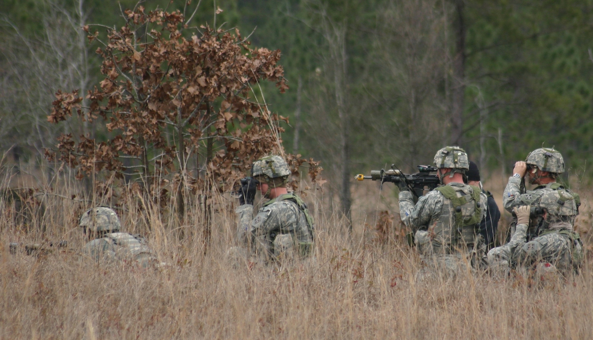 FORT POLK, La. -- U.S. Army joint fires observers search for potential targets near the town of Kostif at JRTC here. (U.S. Air Force photo/Casey E. Bain)