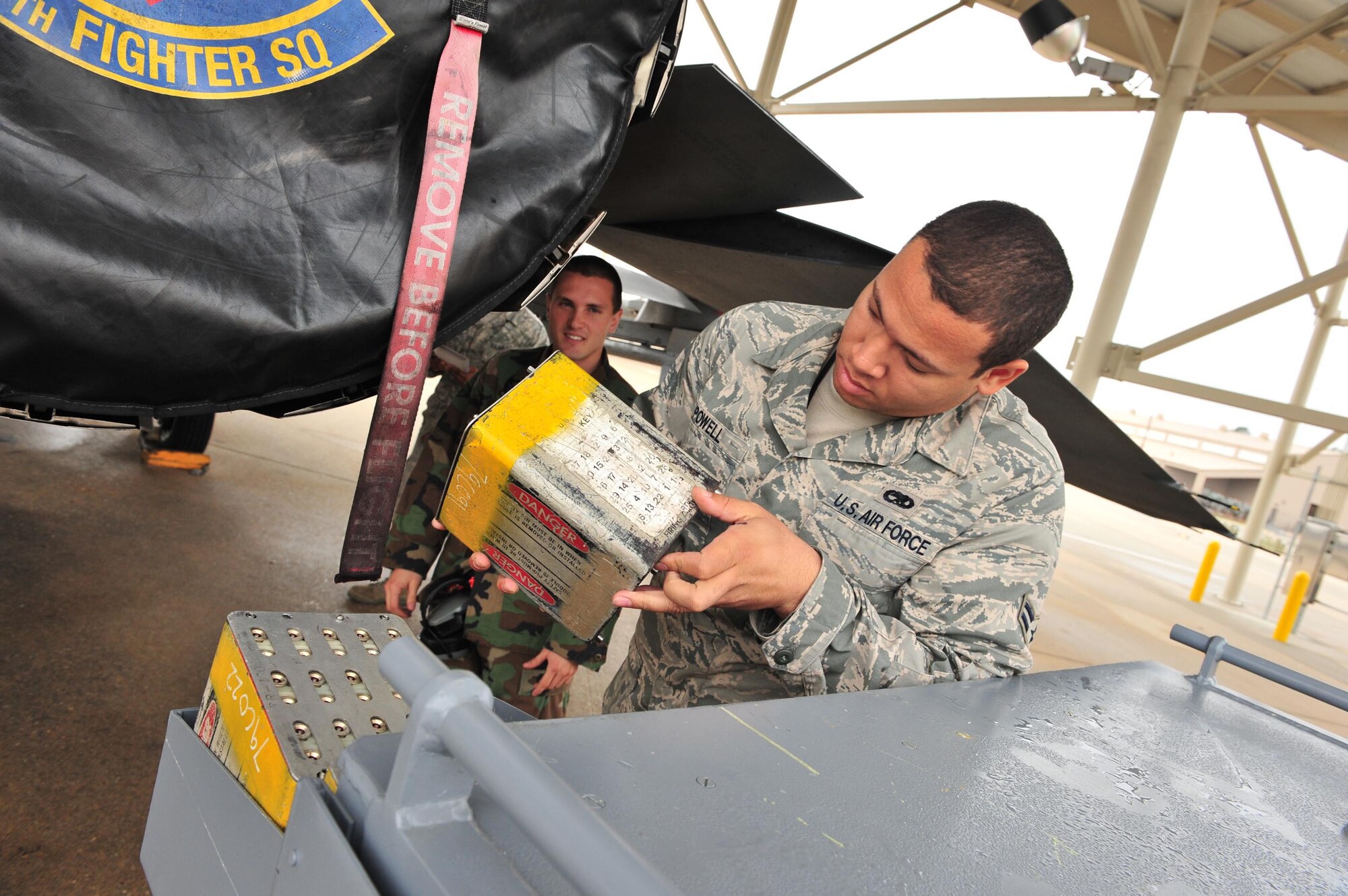 SHAW AIR FORCE BASE, S.C. -- Airman 1st Class D'Artagnan Powell, 79th Aircraft Maintenance Unit, loads chaff and flare modules into newly purchased munitions carts recently. The new munitions carts cut down on man hours for maintainers. (U.S Air Force photo/Tech. Sgt. Joseph Cole)