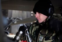 Airman First Class Nathan Brown, 8th Aircraft Maintenance Squadron, performs a function check on an F-16 triple ejector rack during the maintenance training day at Kunsan Air Base, Republic of Korea, Jan 23, 2009. Normal operations were suspended for the day to provide an opportunity for training and to improve proficiency. (U.S. Air Force Photo by Staff Sgt. Jason Colbert)
