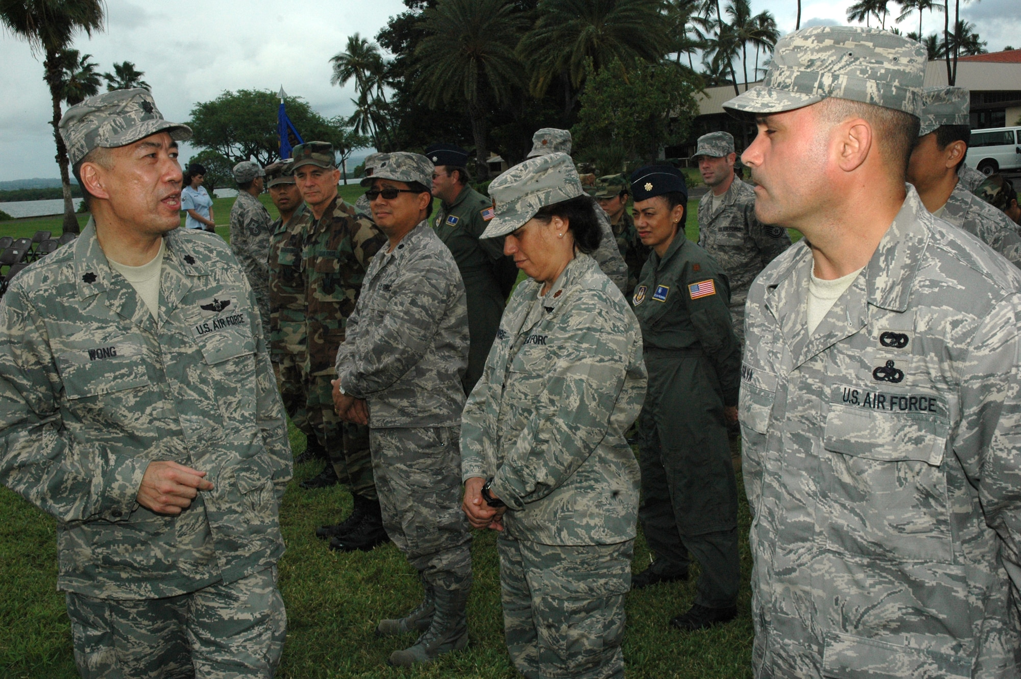 Lt. Col. Deric K. Wong, 624th RSG deputy commander, briefs members of the group prior to the assumption of command ceremony Jan. 10 at Hickam Air Force Base, Hawaii. Col. Robert Huston assumed command of the 624th RSG, which is the largest Air Force Reserve group in the Pacific. Colonel Huston's responsibility as commander of the 624th RSG is managing the largest Air Force Reserve presence in the Pacific, which is comprised of five units in Hawaii and Guam. The group provides the combatant commander more than 650 combat-ready Airmen who specialize in aerial port, aeromedical staging and civil engineering operations for worldwide employment. (Air Force photo/Master Sgt. Daniel Nathaniel)