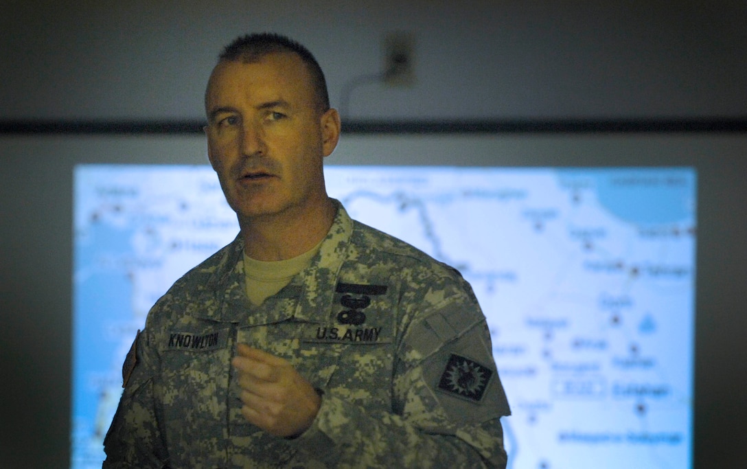 Army Col. Richard K. Knowlton, commander, Wyoming Army National Guard’s 115th Fires Brigade, gives a briefing on the unit’s upcoming deployment at a community meeting at the armory in Douglas, Wyo., Jan. 9, 2009. Knowlton  is using the longer notification time to launch a statewide information campaign to prepare families and business and community leaders for the upcoming deployment in April.