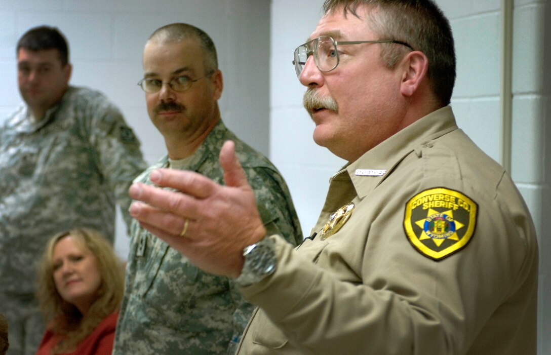 Clint Becker, Wyoming’s Converse County sherriff, attends a National Guard pre-deployment meeting in Douglas, Wyo., Jan. 9, 2009. Brigade leaders, along with state and federal support staff, are reaching out to each community affected by the scheduled April deployment of nearly 1,000 Army National Guard troops.