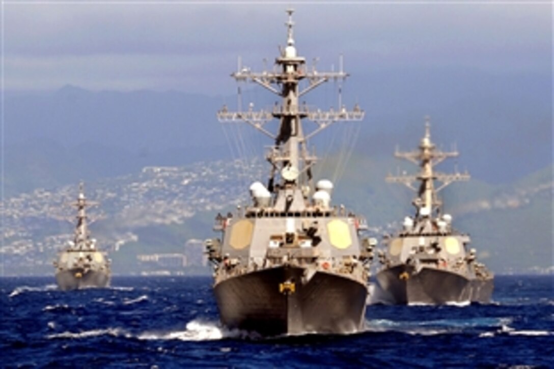 Guided-missile destroyers USS Paul Hamilton, USS Hopper and USS Russell sail in formation during the Naval Surface Group Middle Pacific Surface Combatant Group Sail in the Pacific Ocean, Jan. 15, 2009.