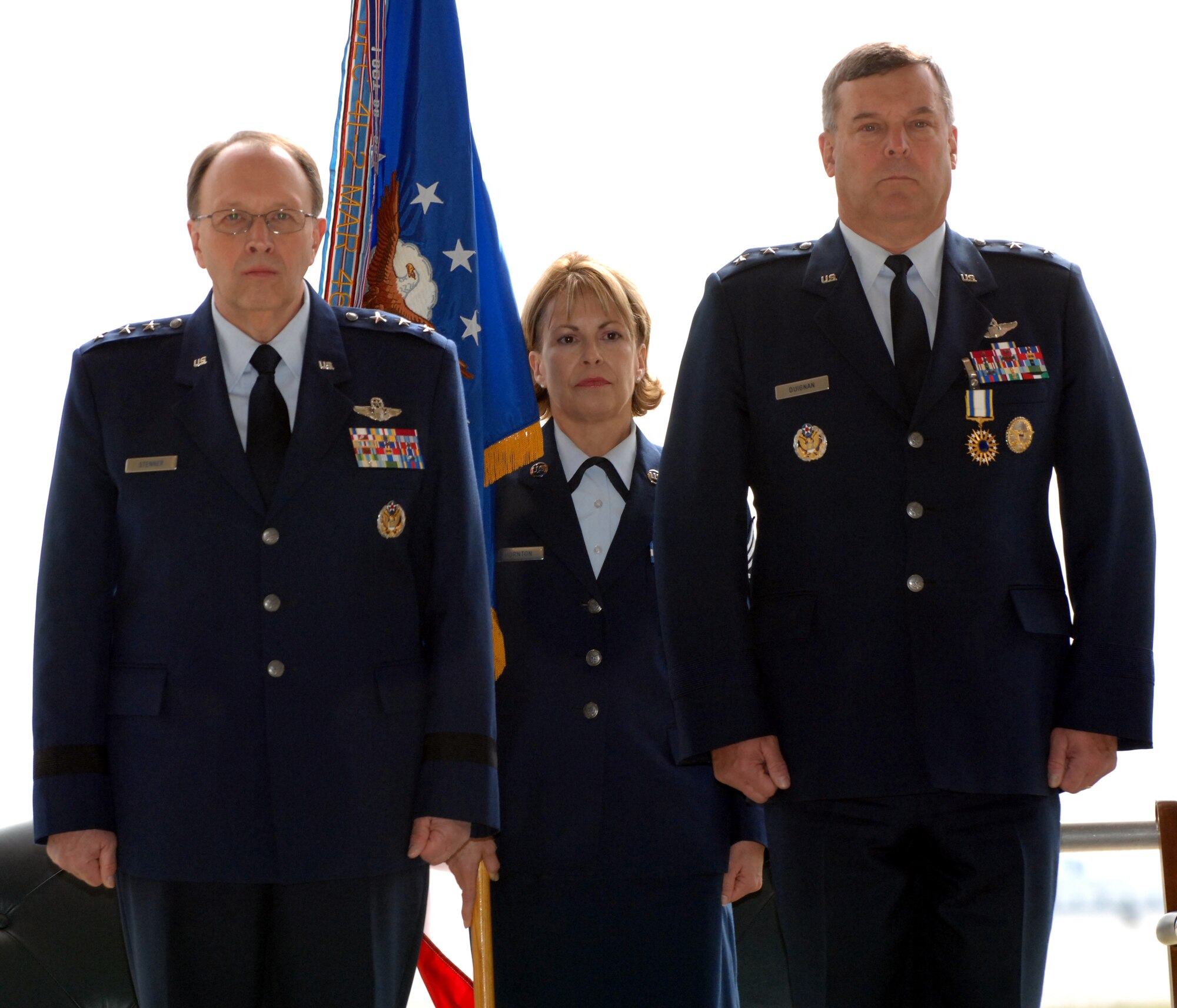 Lieutenant General Charles E. Stenner, Jr., Chief, Air Force Reserve and Commander, Air Force Reserve Command (left) stands attention to orders with Chief Master Sergeant Patricia Thornton, 4th Air Force Command Chief, and Major General Robert E. Duignan, Commander, 4th AF, during a change of command and retirement ceremony for General Duignan at March ARB, Calif., Jan. 25, 2009. (U.S. Air Force courtesy photo) (released)