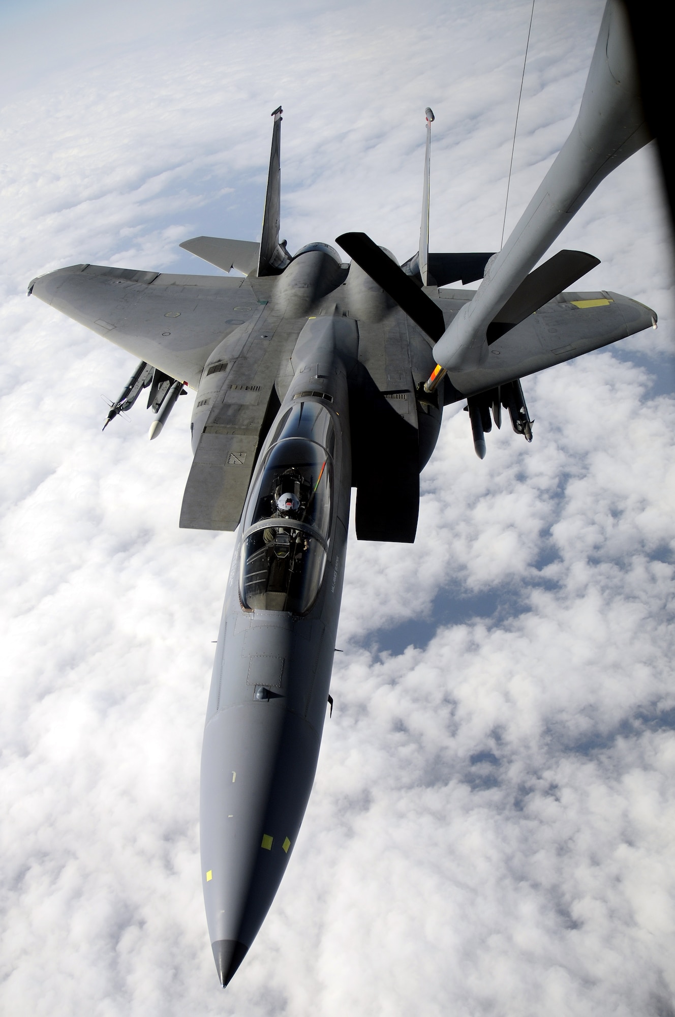 An F-15 Eagle receives fuel from a KC-135 Stratotanker over Kadena Air Base, Japan Jan. 23, 2009. The ability to refuel  without landing greatly increases an aircraft's range and mission capabilities. (U.S. Air Force photo/Airman 1st Class Chad Warren)