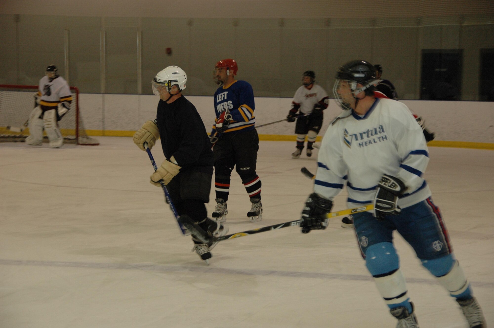 MCGUIRE AIR FORCE BASE, N.J. -- McGuire All-Stars recently practice during a pick-up game at a local rink in preparation for the second annual charity ice hockey match against the Dover Air Force Base All-Stars set for Jan. 31 at the Wachovia Spectrum in Philadlephia. (U.S. Air Force photo/Master Sgt. Donna T. Jeffries)