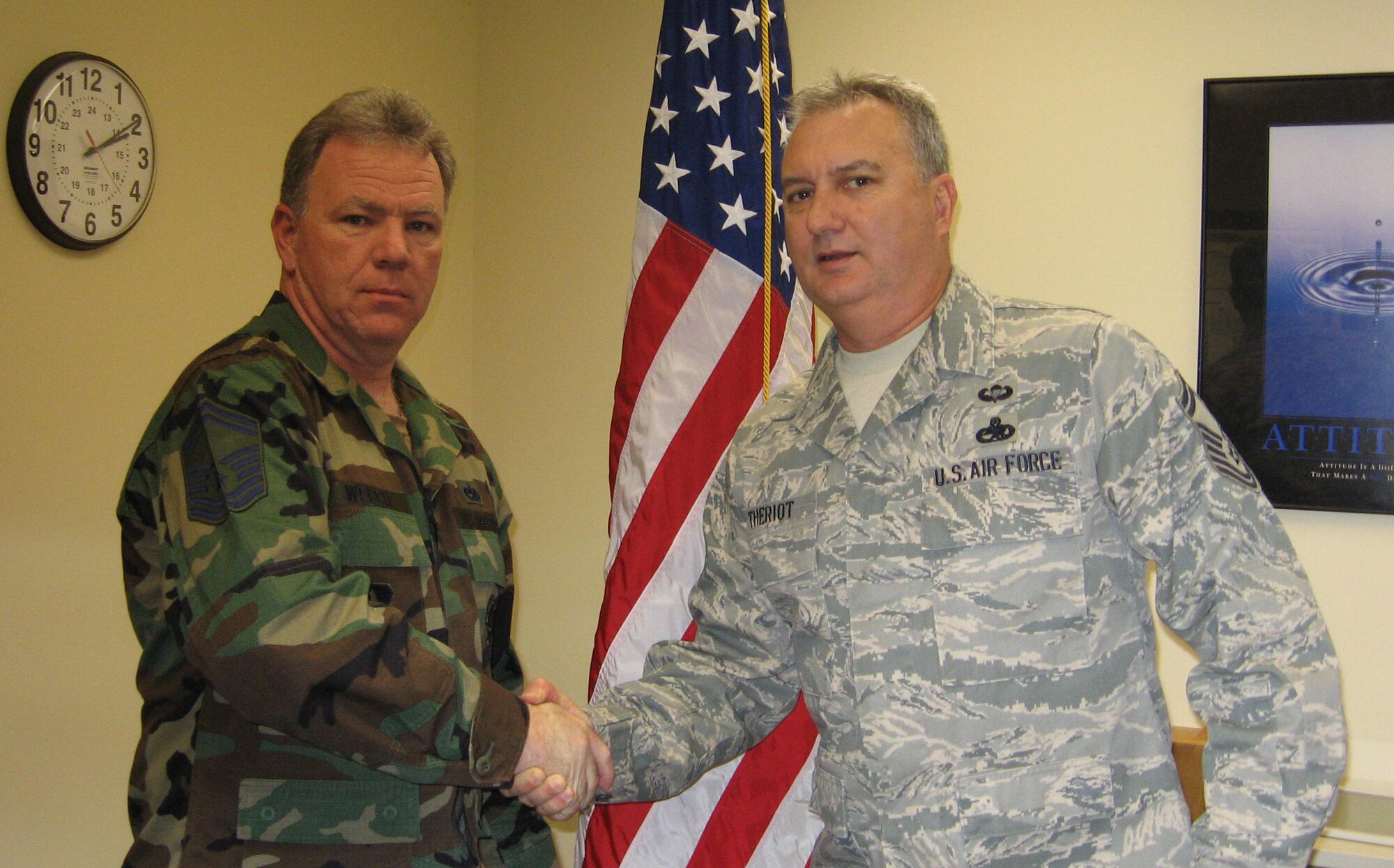 SEYMOUR JOHNSON AIR FORCE BASE, N.C. -- Senior Master Sgt. William Welch (left) is congratulated by Senior Master Sgt. Dave Theriot. Sgt. Welch received his promotion to senior master sergeant during the January unit training assembly. Sgt. Welch is a Reservist with the 916th Maintenance Group and works as a fabrication flight chief.
