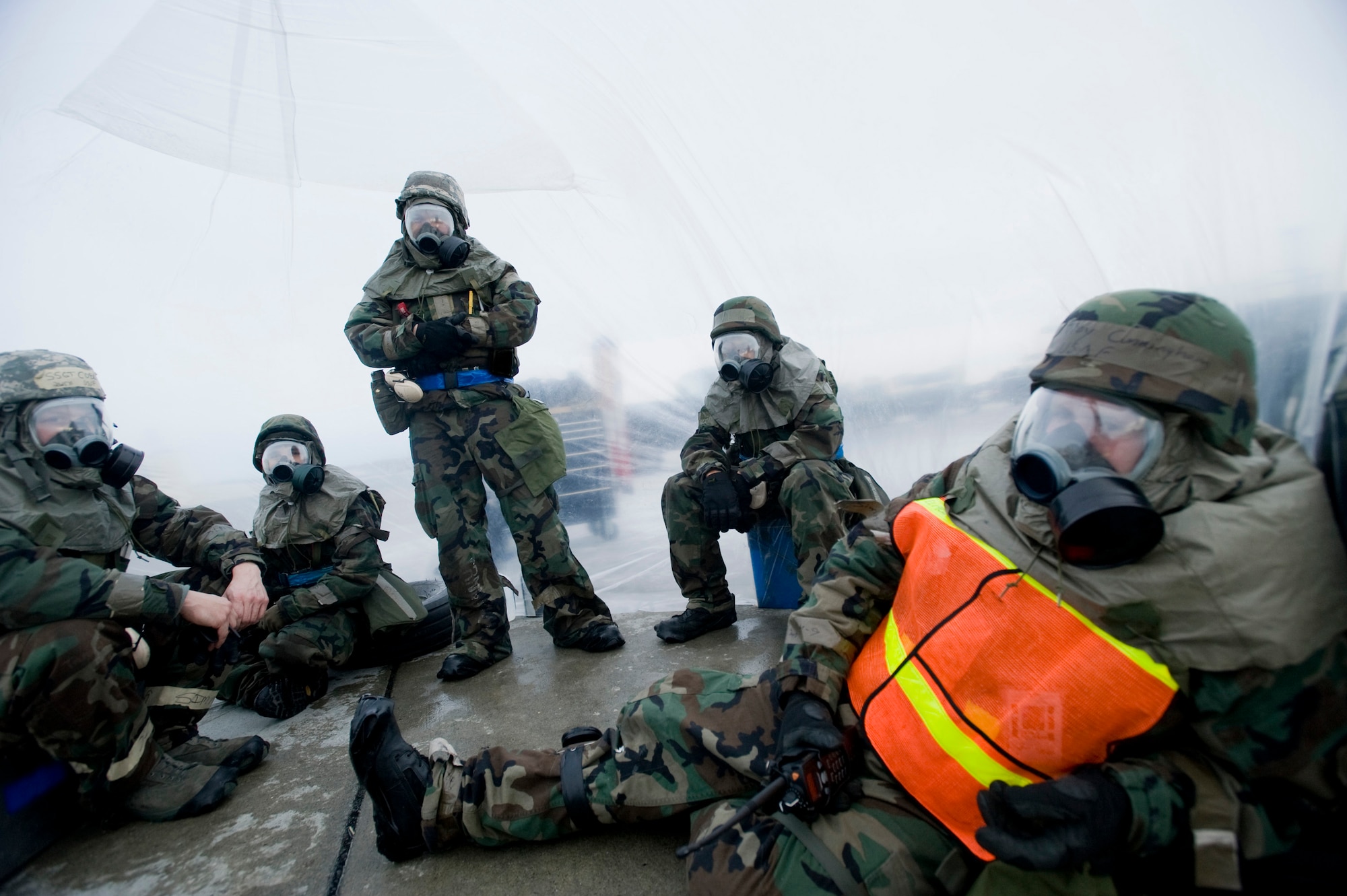 ELMENDORF AIR FORCE BASE, Alaska--F-15 crew chiefs from the 19th Aircraft Maintenance Unit wait in their heat bubble for the F-15s to land, Jan. 22. The 19th AMU participated in Polar Force Exercise 09-2 in preparation for an upcoming Operation Readiness Inspection. (U.S. Air Force photo/Senior Airman Jonathan Steffen)