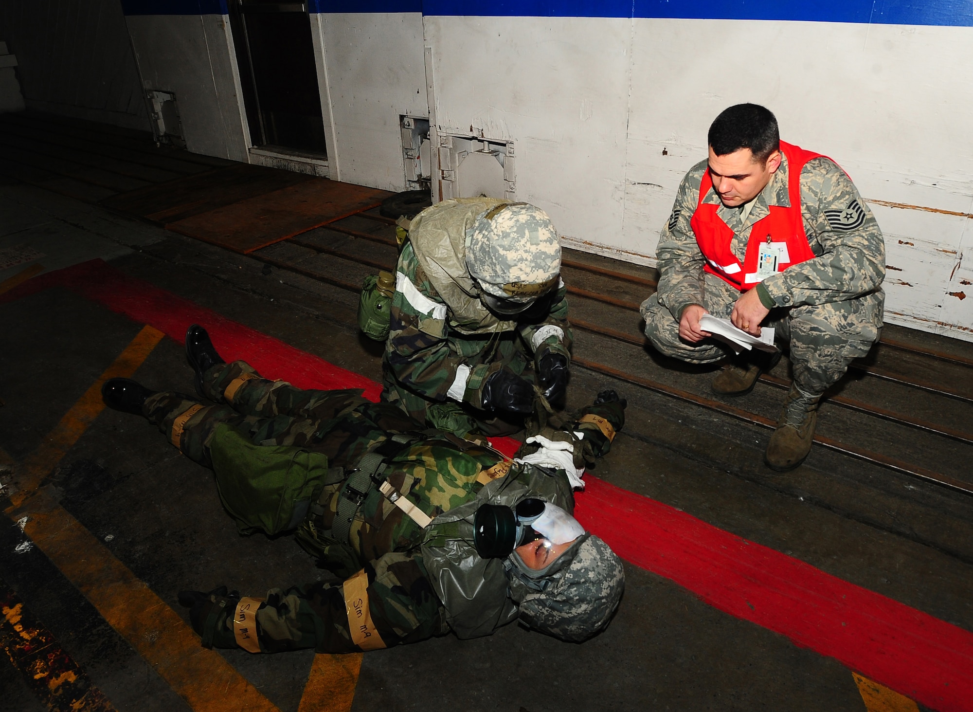 ELMENDORF AIR FORCE BASE, Alaska--Technical Sergeant Brian Halle, 3rd Medical Support Squadron, supervises an exercise Jan. 21. TSgt Halley participated in Polar Force Exercise 09-2 in preparation for an upcoming Operation Readiness Inspection. (U.S. Air Force photo/Airman First Class Kristin High)