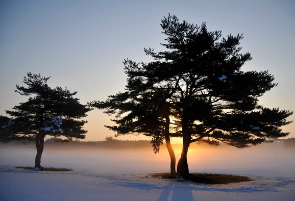 MISAWA AIR BASE, Japan -- The sun rises over the fog on the Misawa Air Base golf course, Jan. 22, 2009.  the fog is usually a lot thicker near the golf course with Lake Ogawara nearby.  (U.S. Air Force photo by Senior Airman Chad Strohmeyer)