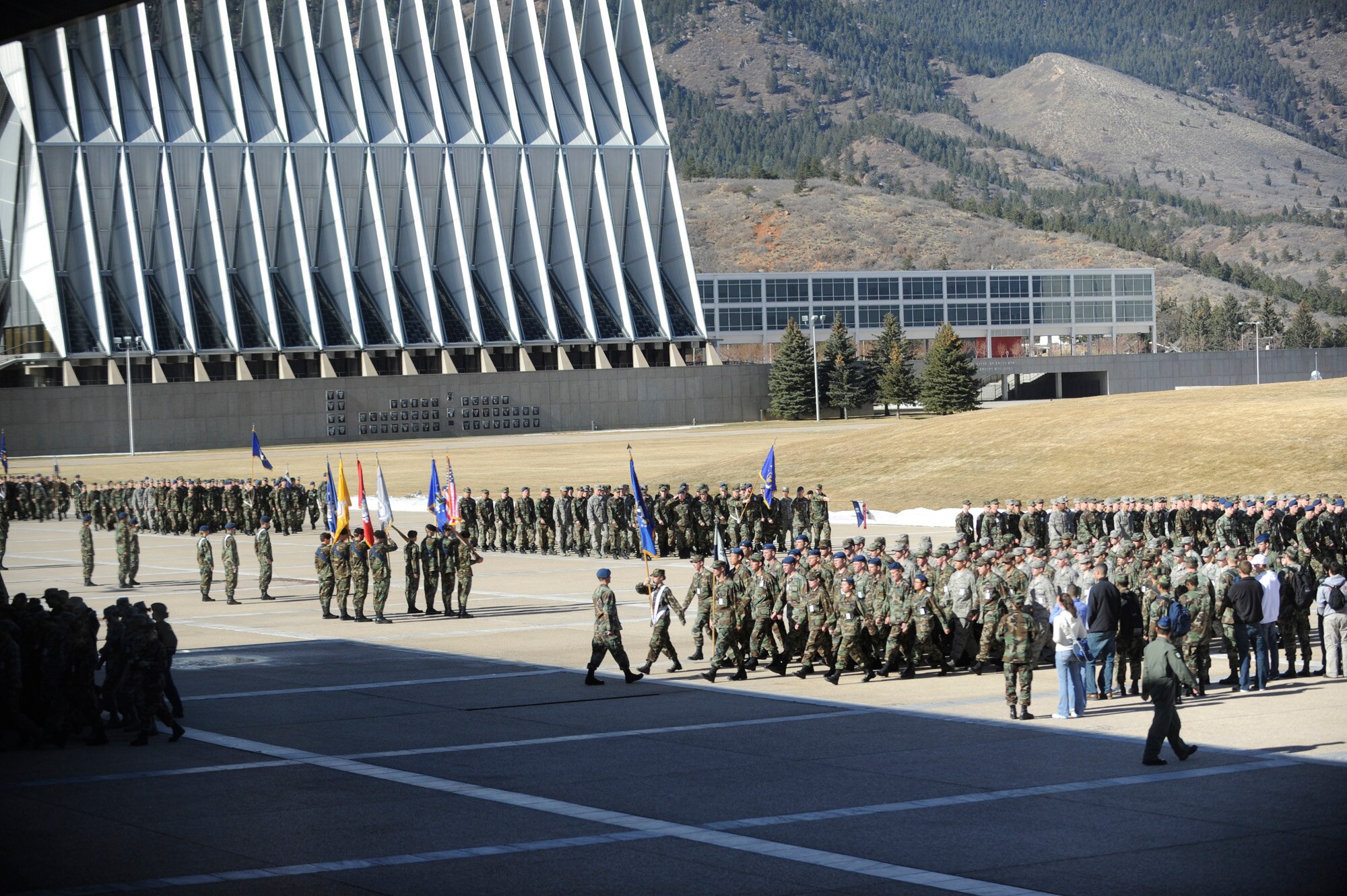 Cadets march past the chapel at the U.S. Air Force Academy in Colorado Springs, Colo., Jan. 23 on their way to Mitchell Hall Cadet Dining Facility. The dining facility feeds approximately 4450 cadets and sits on 1.75 acres. (U.S Air Force photo/Staff Sgt. Desiree N. Palacios)