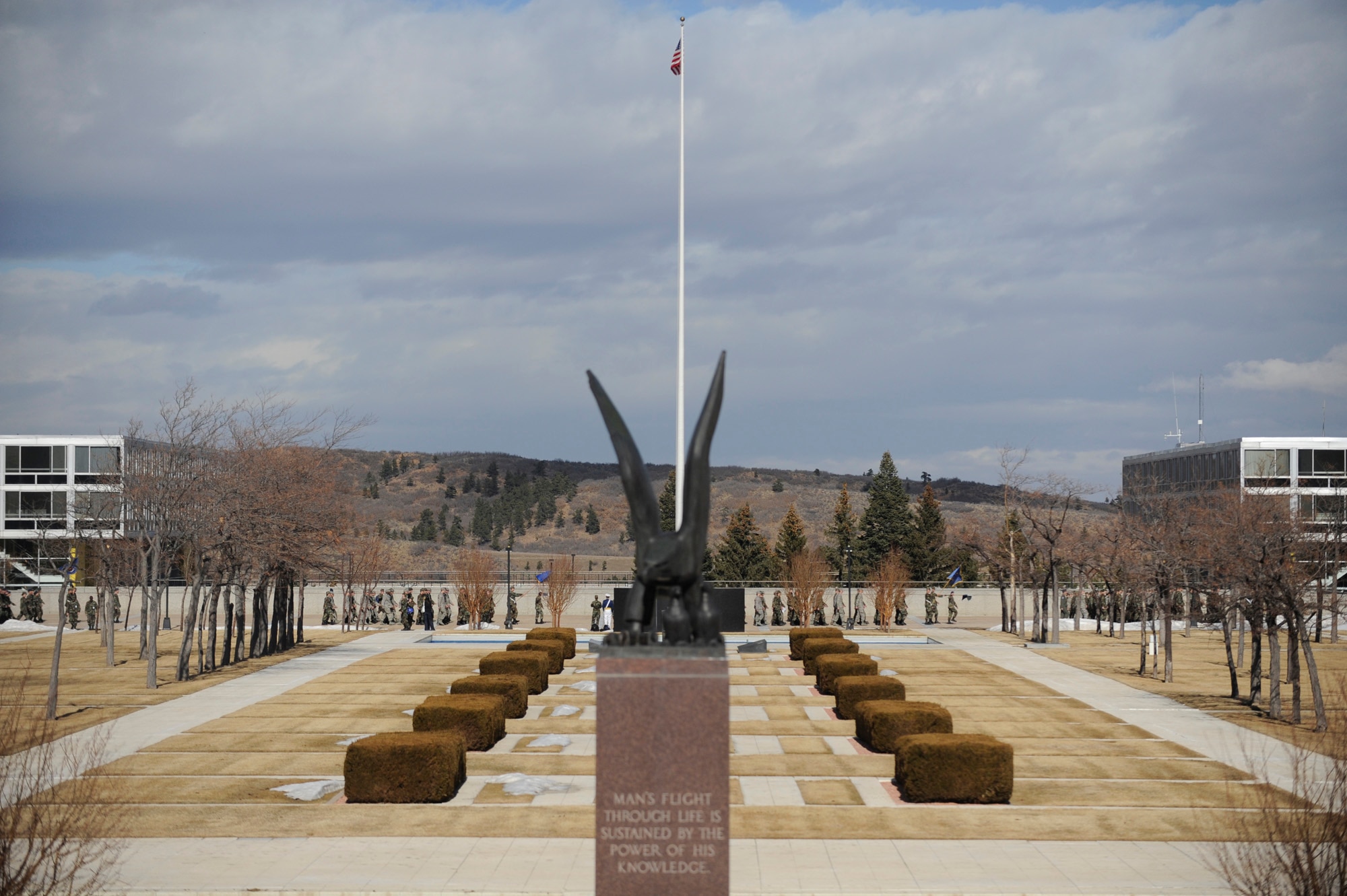 At the far end of the plaza at the U.S. Air Force Academy in Colorado Springs, Colo., cadets march to Mitchell Hall Cadet Dining Facility Jan. 23.  The dining facility feeds approximately 4450 cadets and sits on 1.75 acres.  (U.S Air Force photo/Staff Sgt. Desiree N. Palacios)