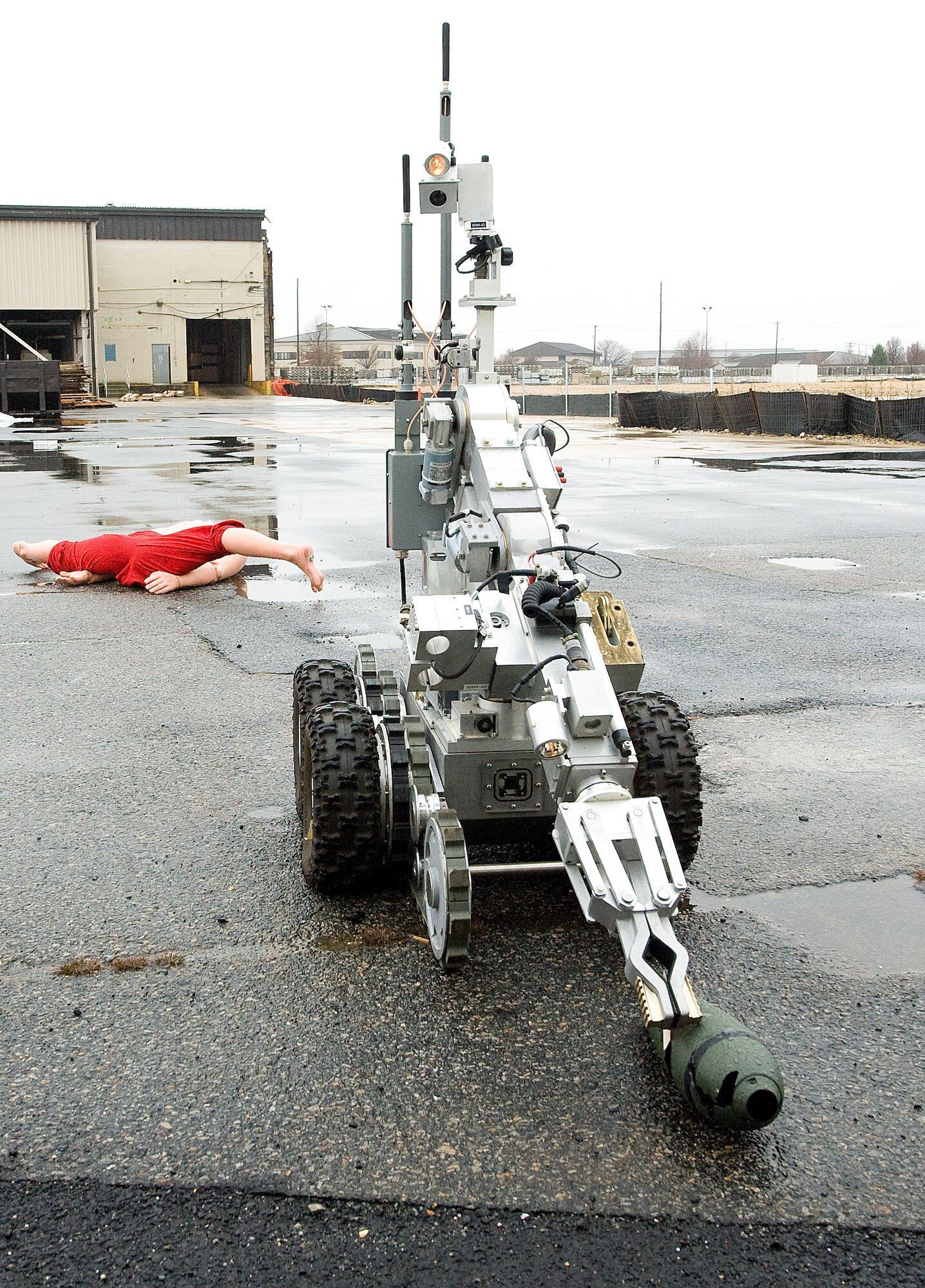 Explosive Ordnance Disposal Airmen utilize a robot to secure an un-exploded ordinance during a Major Accident Response Exercise on Dover Air Force Base recently. In Delaware alone, the 436th Civil Engineer Squadron’s EOD flight recovered more than 1,200 ordnance items and was lauded by the Delaware State Police for this contribution.   (U.S. Air Force photo/Tom Randle)