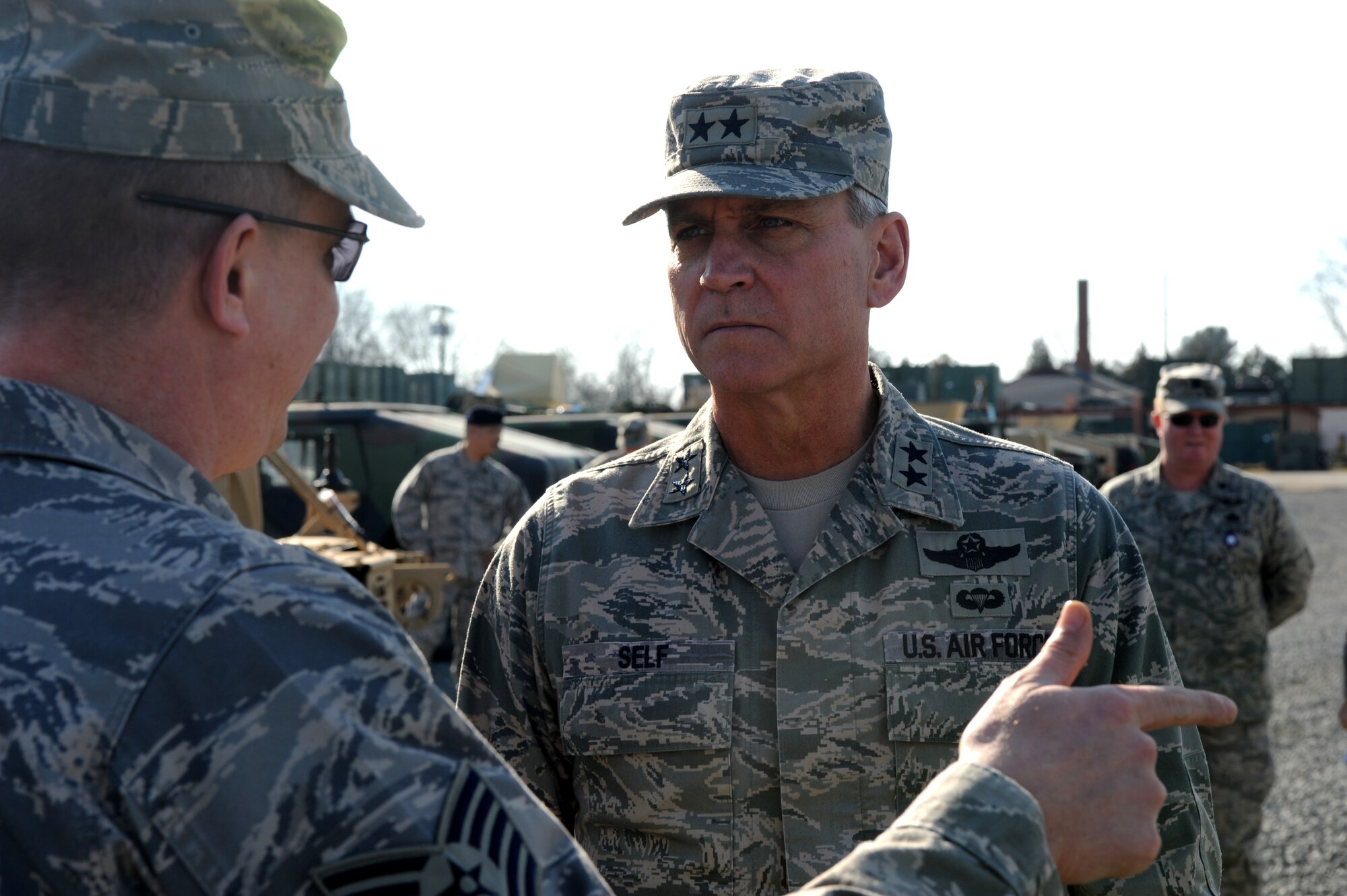 Maj. Gen. Kip Self, U.S. Air Force Expeditionary Center commander, is briefed by Tech. Sgt. Scott Mueller, Expeditionary Operations School, about one of the new Light Medium Tactical Vehicles at Fort Dix, NJ, Jan. 23.  The Expeditionary Center vehicle fleet will include 11 LMTV’s with a 2.5-ton capacity replacing the M35 half-ton trucks.  (U.S. Air Force Photo/Staff Sgt. Nathan Bevier)