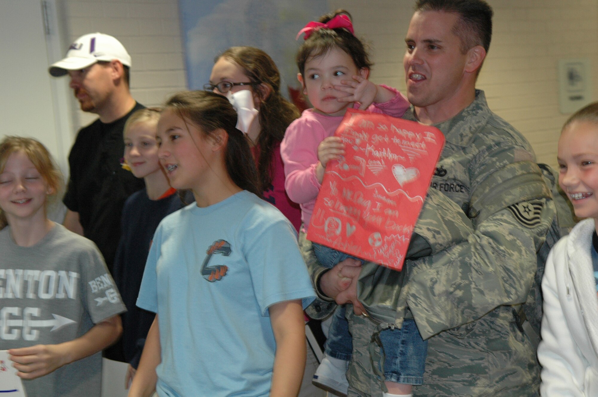Tech, Sgt. Steve Smith, 917th Security Forces Squadron returns from Kirkuk Regional Air Base after a six month deployment on Jan 23. He was met by his family at the Shreveport Regional Airport. 