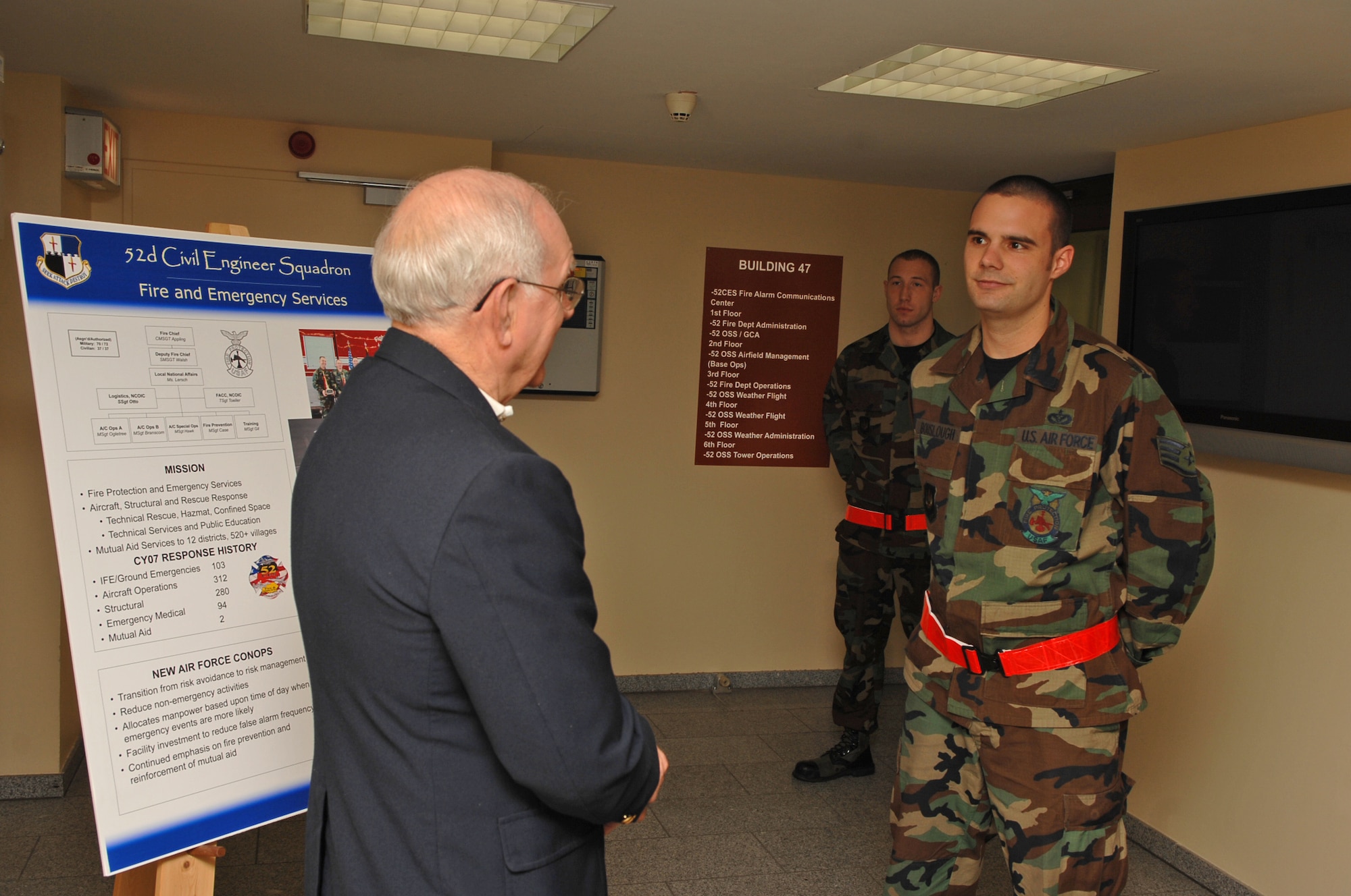 SPANGDAHLEM AIR BASE, Germany -- Staff Sgt. Derek Bouslough and Senior Airmen Chastin Warner, 52 Civil Engineer Squadron fire fighters, facilitate a tour for Sam Parish, 8th Chief Master Sgt. of the Air Force, January 21, 2009.   Chief Parish answered many questions about the past, present, and future of the Air Force.  (U.S. Air Force photo by Airman 1st Class Nicholas Wilson)