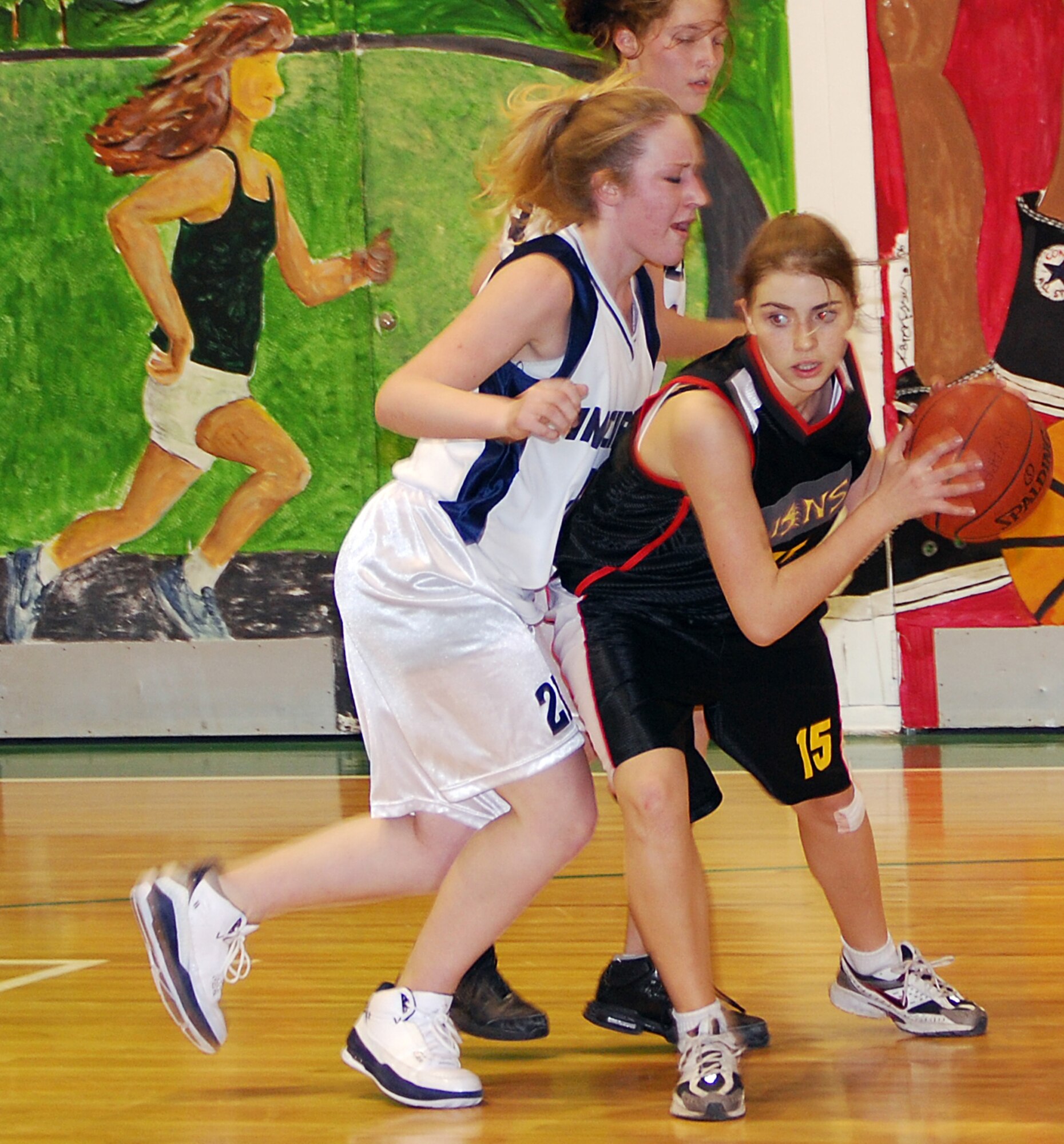 Ashley Hagner, Incirlik Unit School Hodjas, defends the hoop during a tournament game Jan.23. The IUS girls team went on to take first place in the tournament. (Photo/Col. Lawrence Gray)