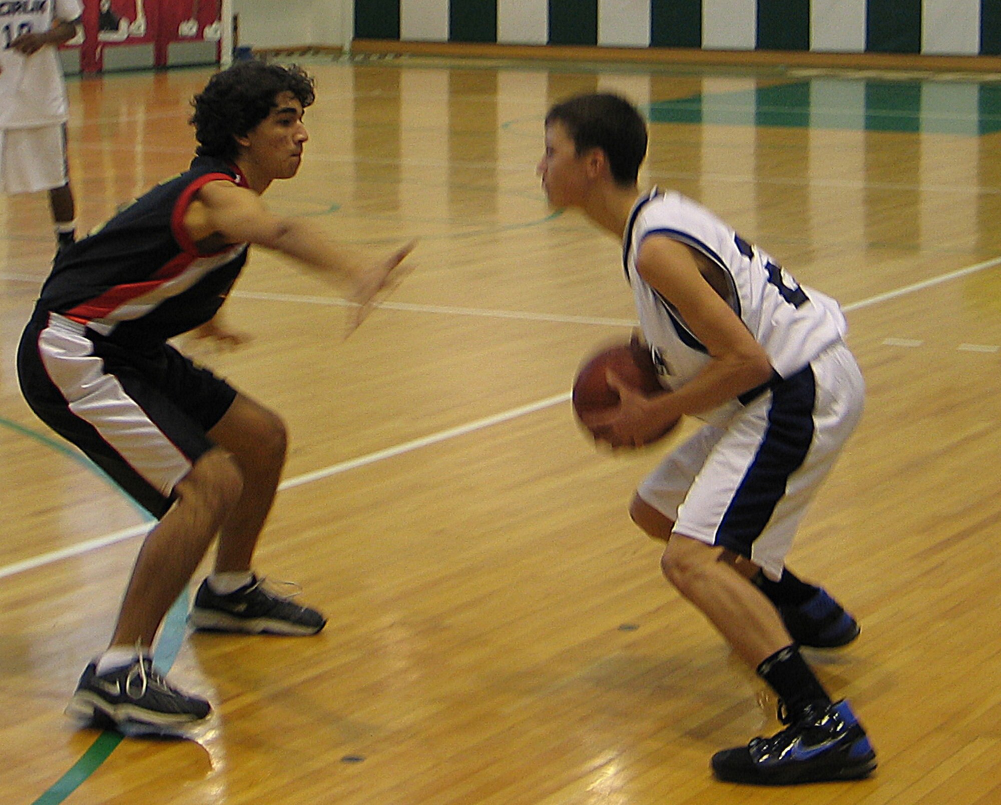 An Istanbul high school student tries to block the lane against Luke Gray, Incirlik Unit School Hodjas. IUS went on to take second place in the tournament. (U.S. Air Force photo/Lt. Col. Pete York)