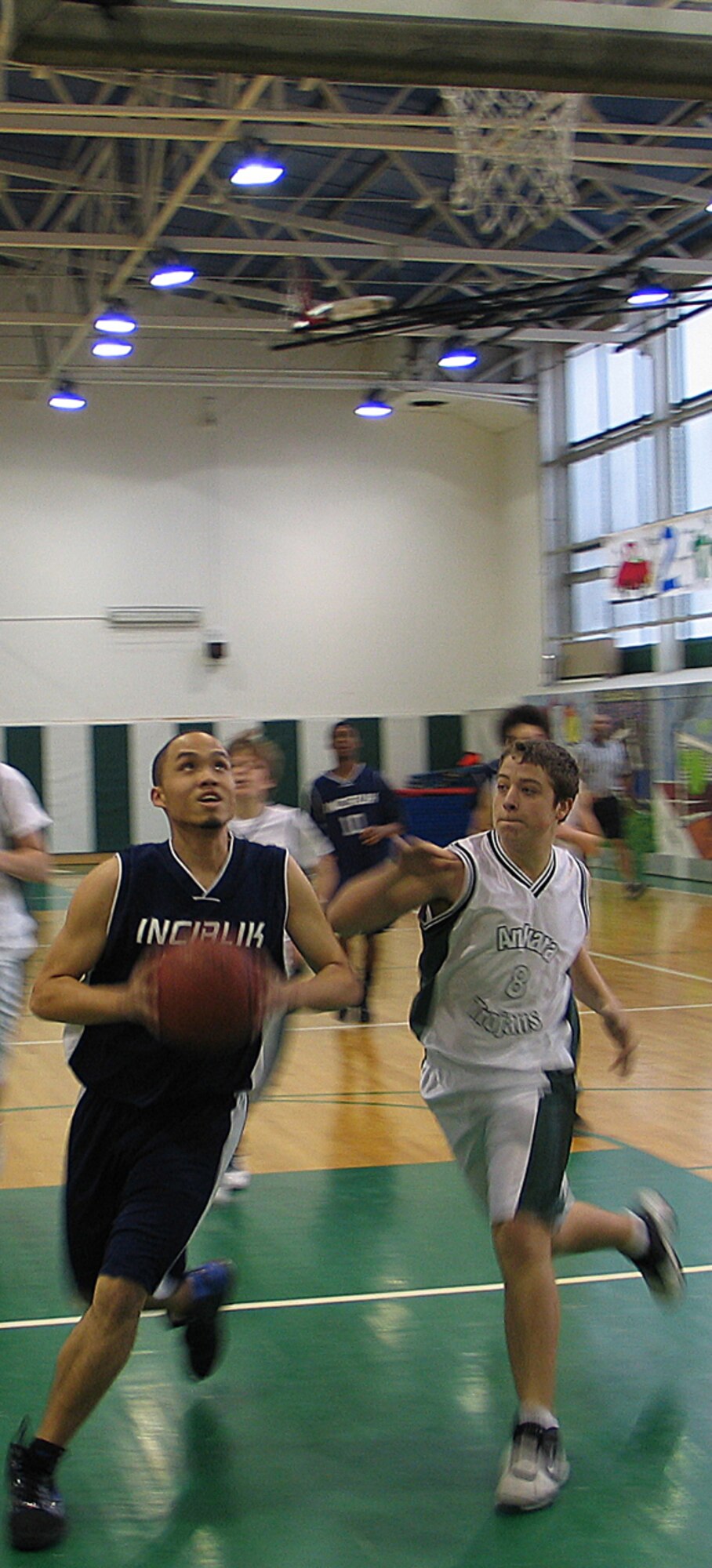 Joshua Calloway, Incirlik Unit School boys basketball Hodjas, prepares for a lay-up during a tournament game Jan. 23 against the Ankara Trojans. (U.S. Air Force photo/Lt. Col. Pete York)