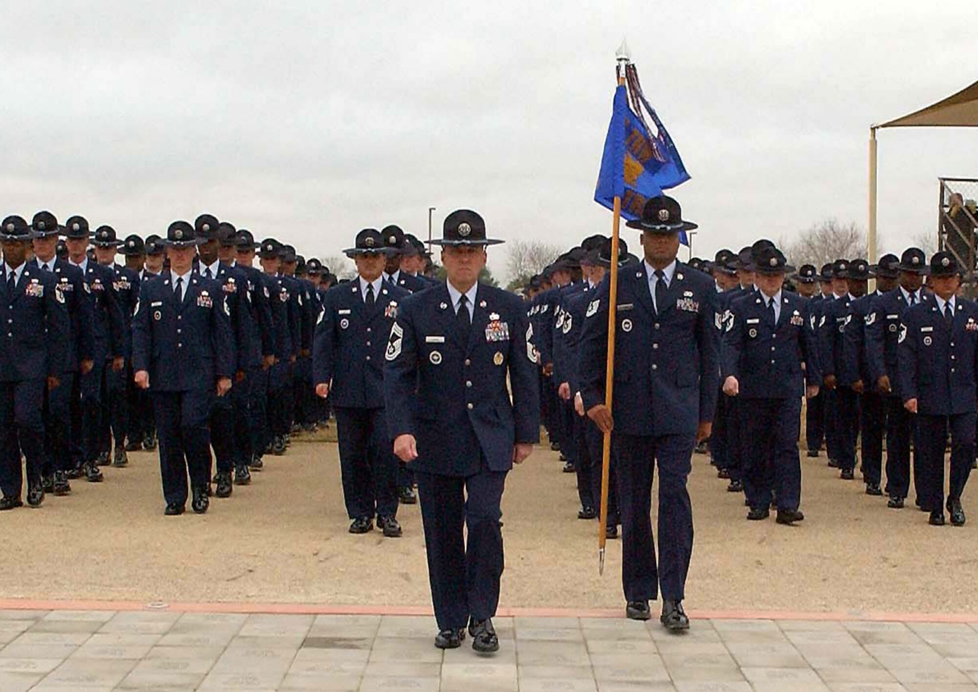 A flight formation prepares to graduate from Basic Military Training Jan. 2 at Lackland Air Force Base, Texas. BMT is in need of motivated military training instructors and, to help recruit new MTIs, the Dover AFB career assistance advisor is scheduled to host a MTI application briefing in the 3rd Airlift Squadron auditorium, Feb. 2. (U.S. Air Force Photo/Alan Boedeker)